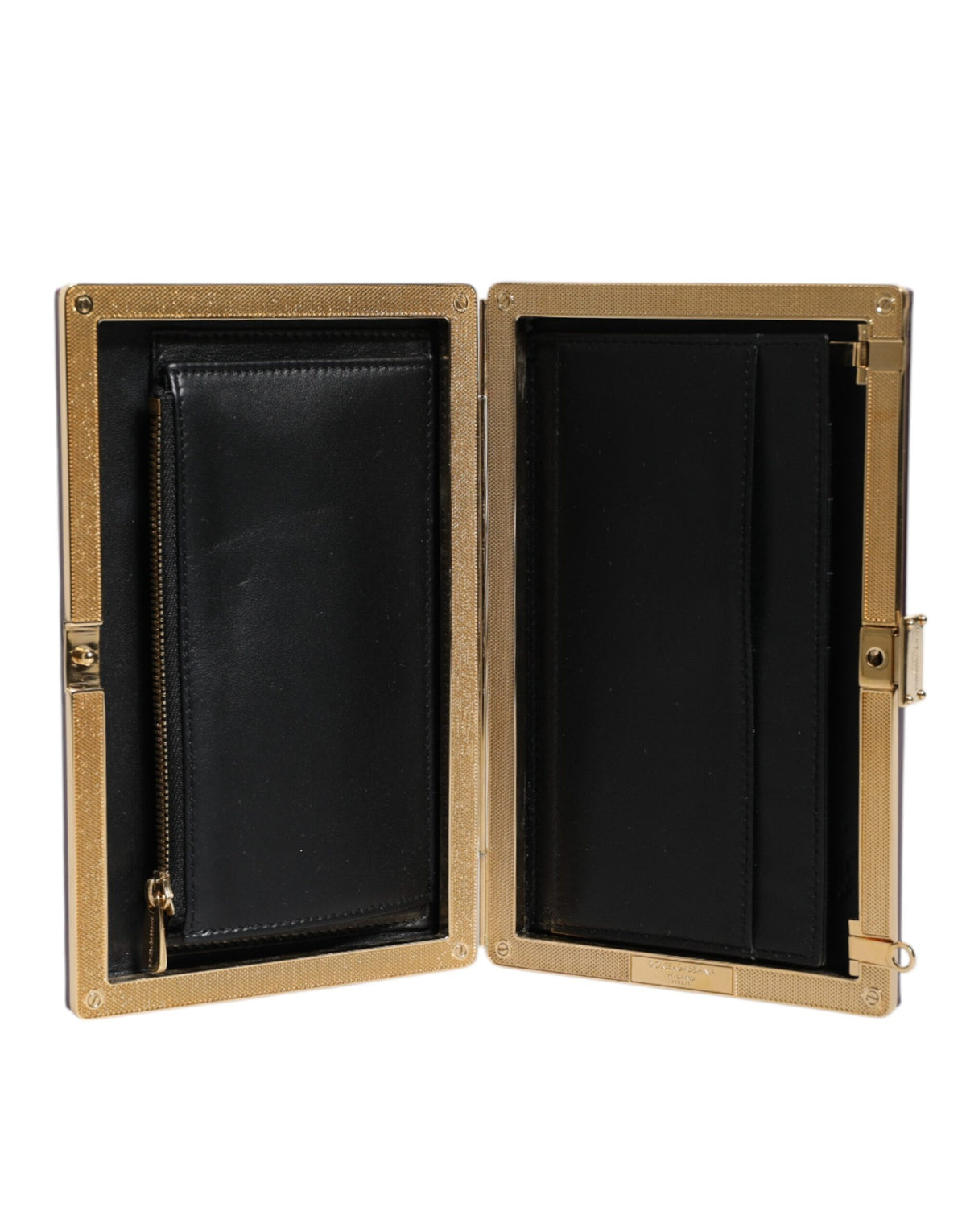 Indulge in the exquisite Dolce & Gabbana Purple Leather Clutch, a handcrafted masterpiece that elevates your evening attire with timeless elegance and artisanal allure.