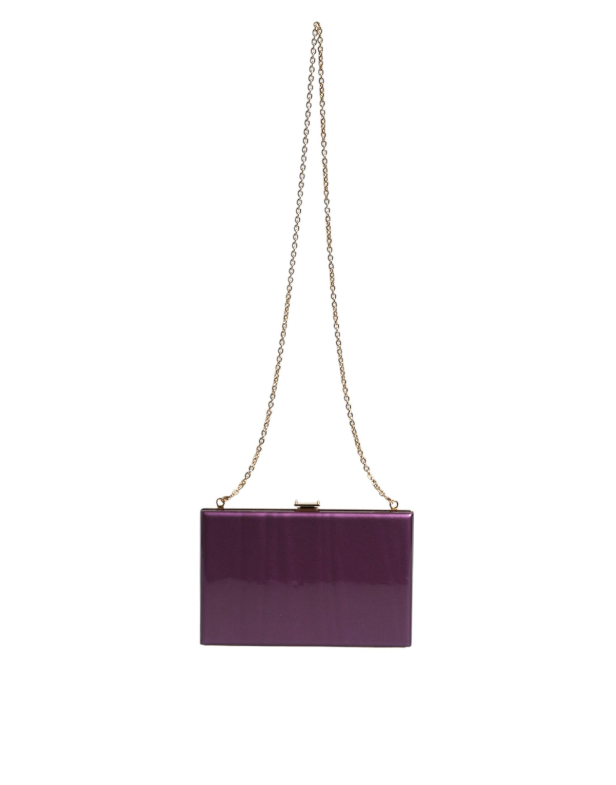 Indulge in the exquisite Dolce & Gabbana Purple Leather Clutch, a handcrafted masterpiece that elevates your evening attire with luxurious elegance and timeless allure.