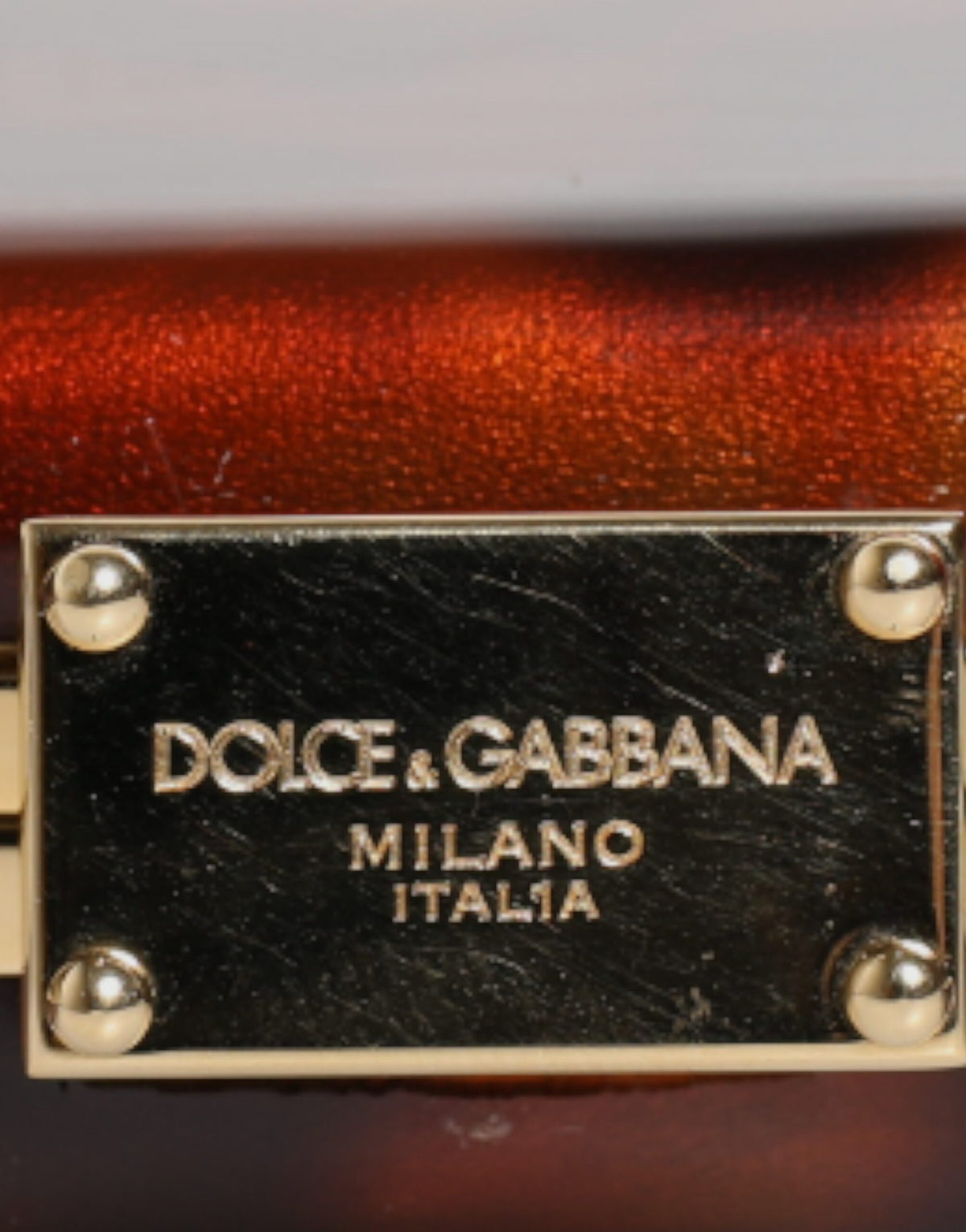 Experience the allure of the Dolce & Gabbana Brown Leather Clutch, a vintage masterpiece crafted in Italy, embodying timeless elegance and exquisite luxury for discerning tastes.