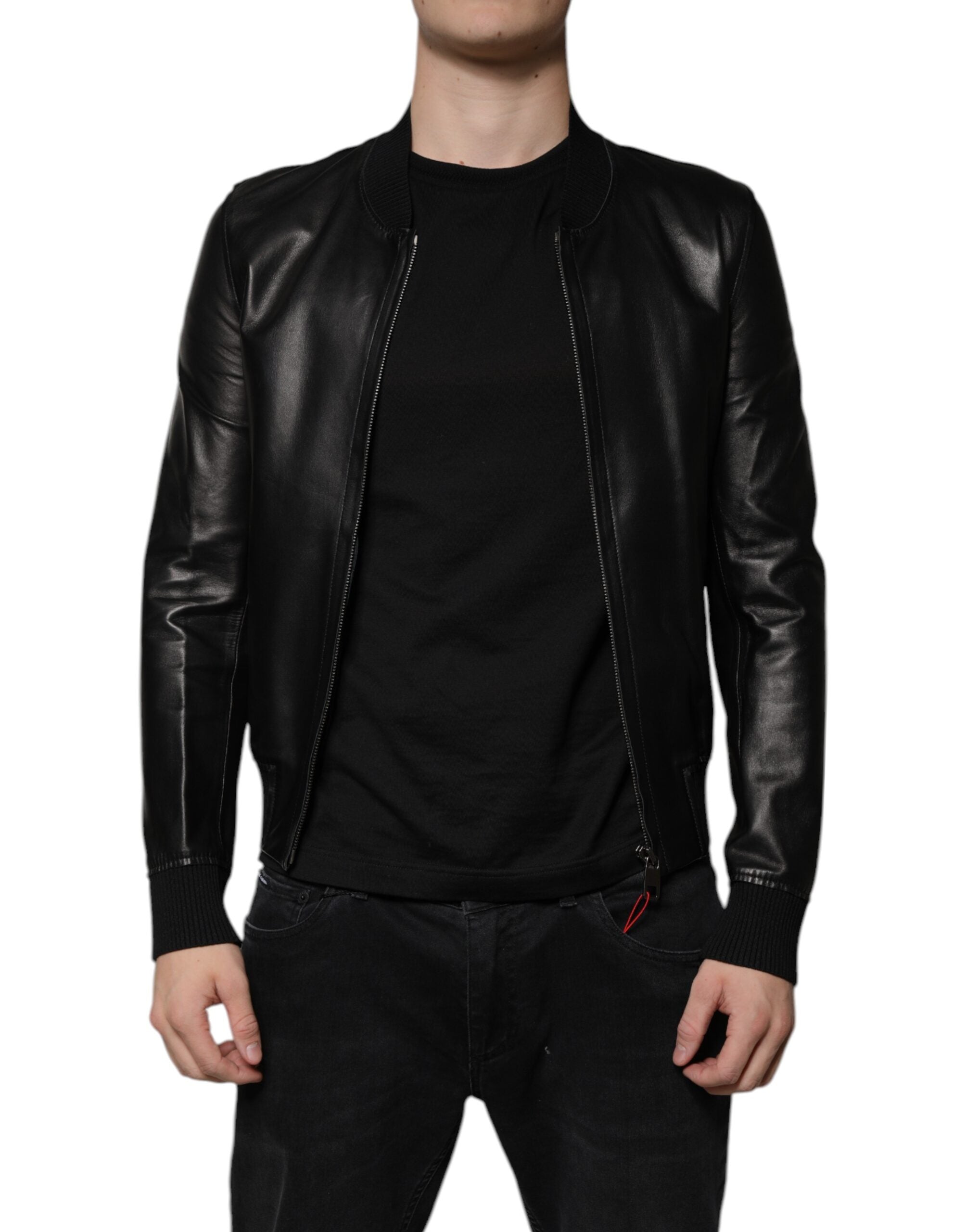 Indulge in the exquisite Dolce & Gabbana Black Lambskin Full Zip Biker Blouson Jacket, a timeless piece that embodies elegance and artisanal luxury for the discerning connoisseur.