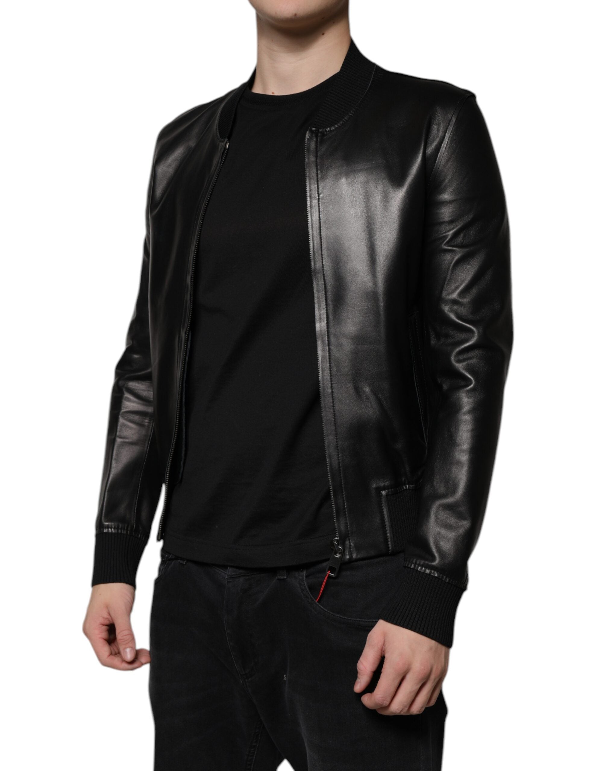 Elevate your wardrobe with the Dolce & Gabbana Black Lambskin Full Zip Biker Blouson Jacket, a masterpiece of Italian craftsmanship that embodies timeless elegance and sophistication.