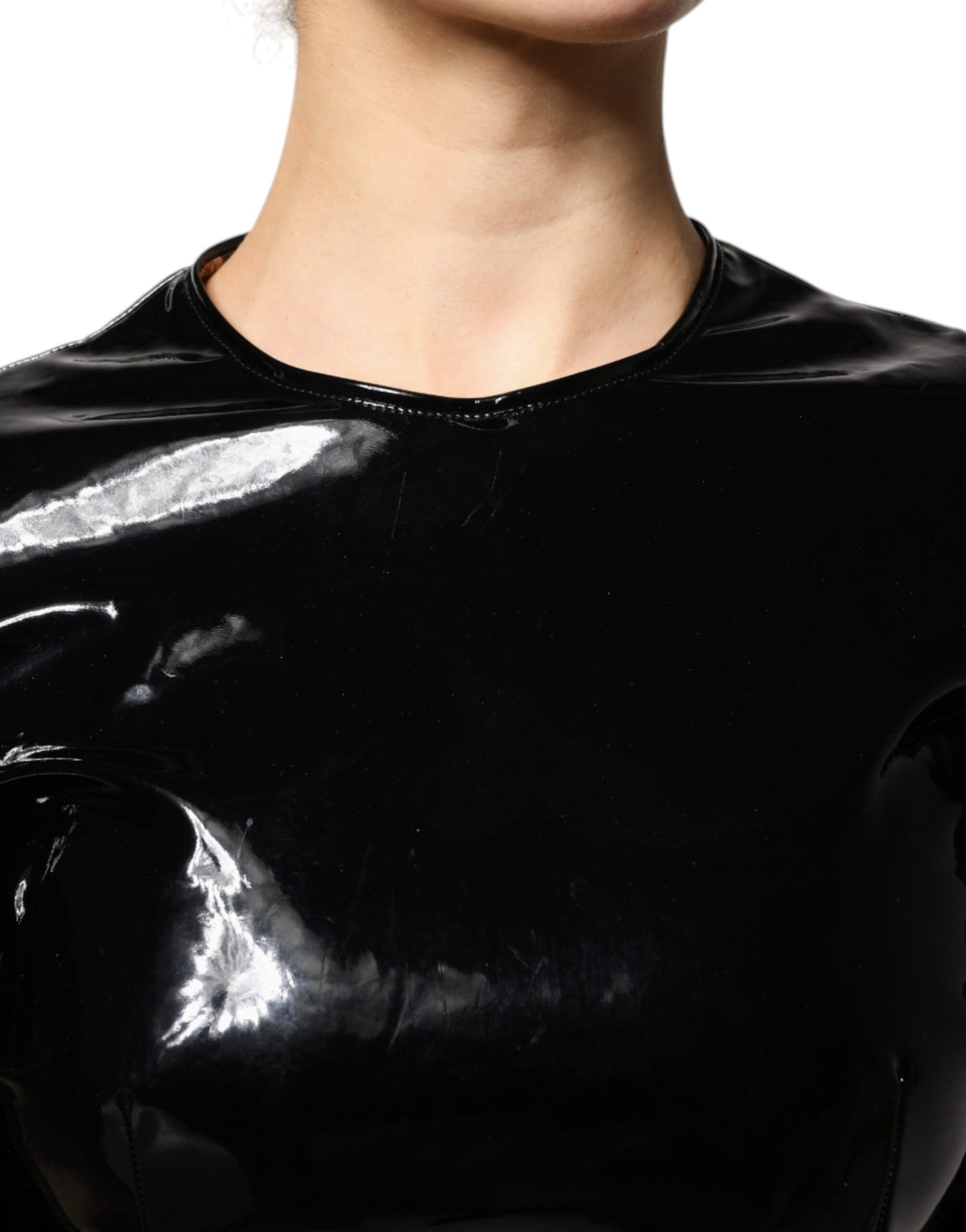 Indulge in the allure of Dolce & Gabbana's Black Patent Leather Puff Sleeves Mini Dress, a masterpiece of Italian craftsmanship that embodies luxury and sophistication for the discerning connoisseur.