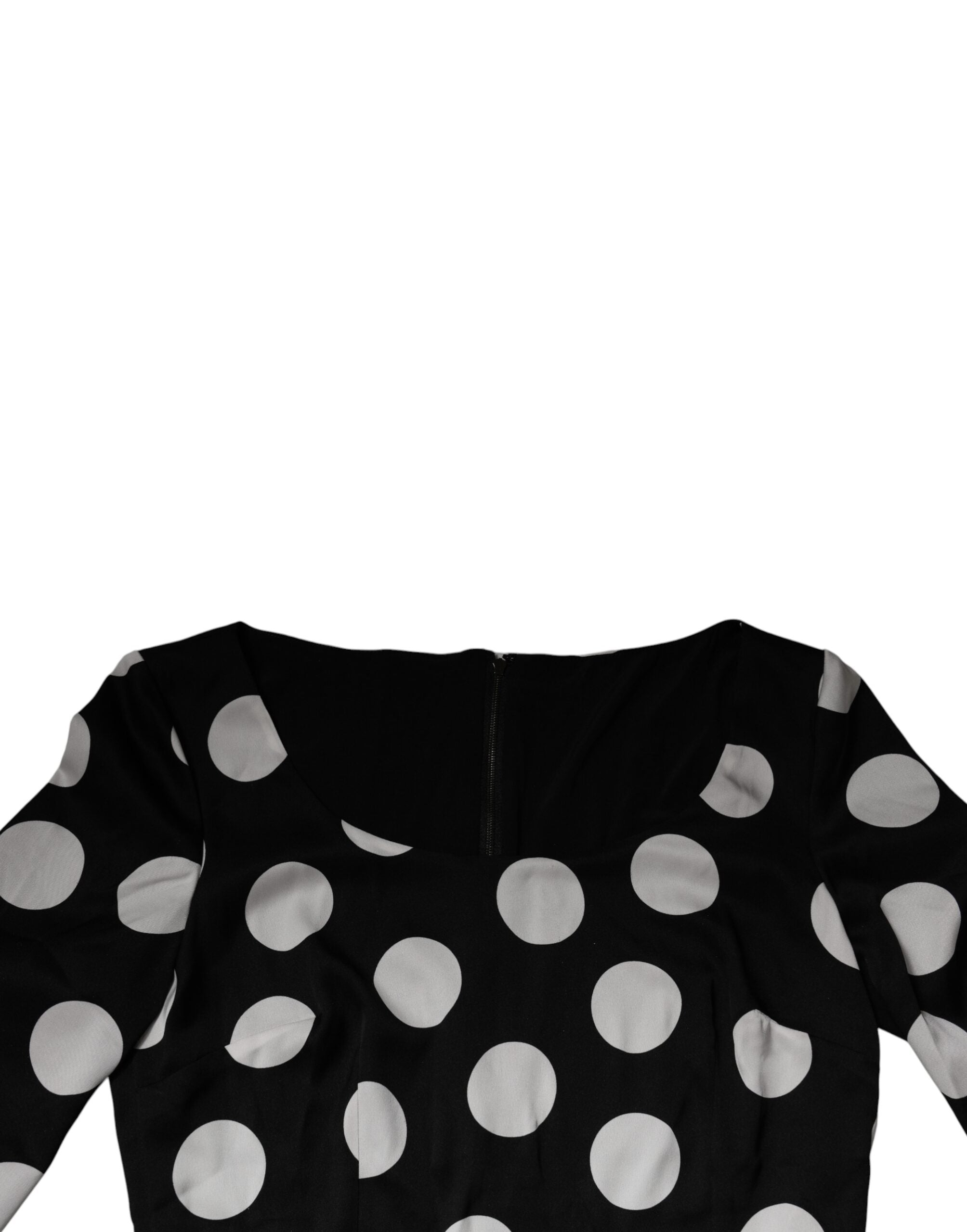 Indulge in the exquisite Dolce & Gabbana Black White Silk Polka Dots Sheath Midi Dress, a timeless piece of luxurious craftsmanship that elevates your elegance and allure.