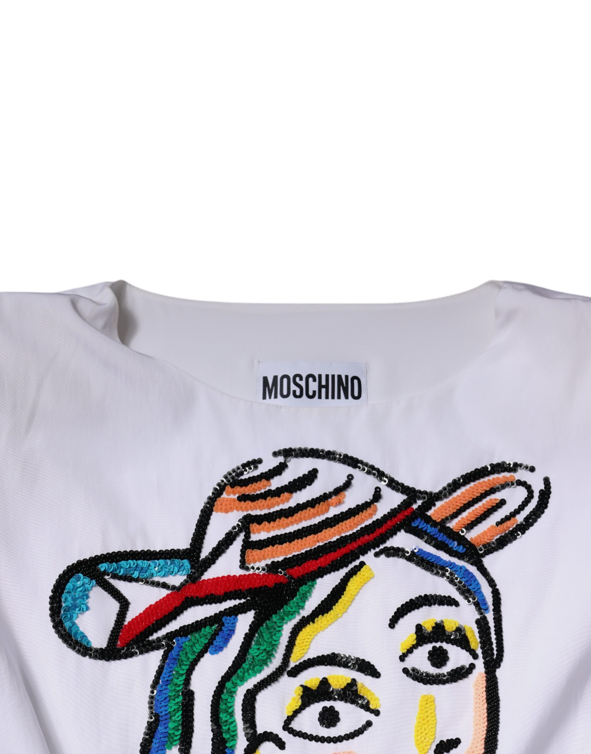 Elevate your wardrobe with the Moschino Couture White Printed Viscose Sheath Mini Dress, a masterpiece of luxury and sophistication, perfect for any upscale occasion.