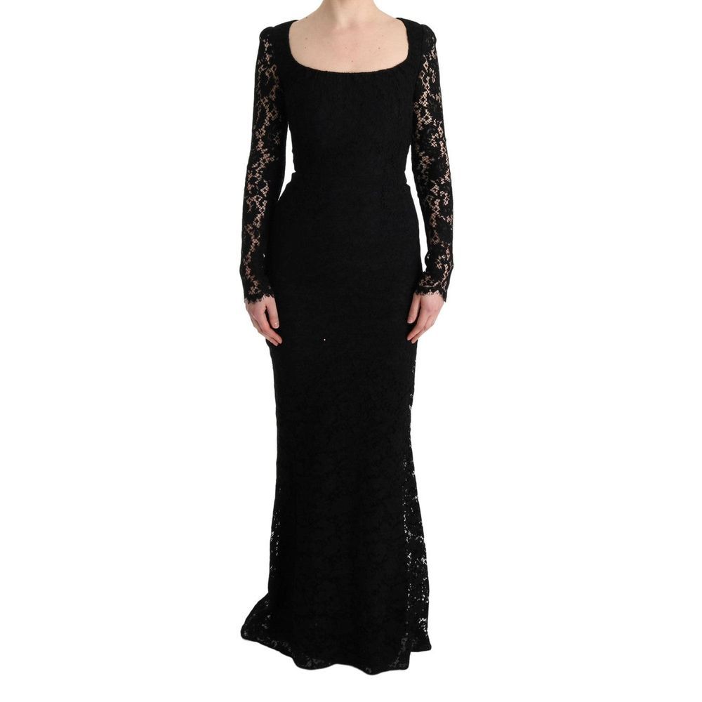 Elevate your elegance with the Dolce & Gabbana Black Cotton Cocktail Dress, a luxurious blend of floral lace and exquisite craftsmanship, perfect for unforgettable soirées.