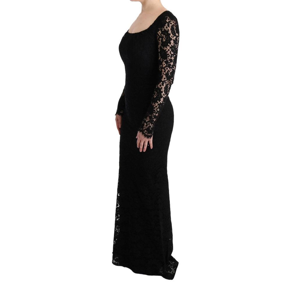 Elevate your elegance with the Dolce & Gabbana Black Cotton Cocktail Dress, a luxurious blend of floral lace and exquisite craftsmanship, perfect for unforgettable soirées.