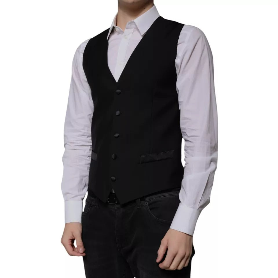 Indulge in the exquisite Dolce & Gabbana Black Wool Formal Dress Waistcoat Vest, a masterpiece of Italian craftsmanship, blending luxurious materials for timeless elegance and refined allure.