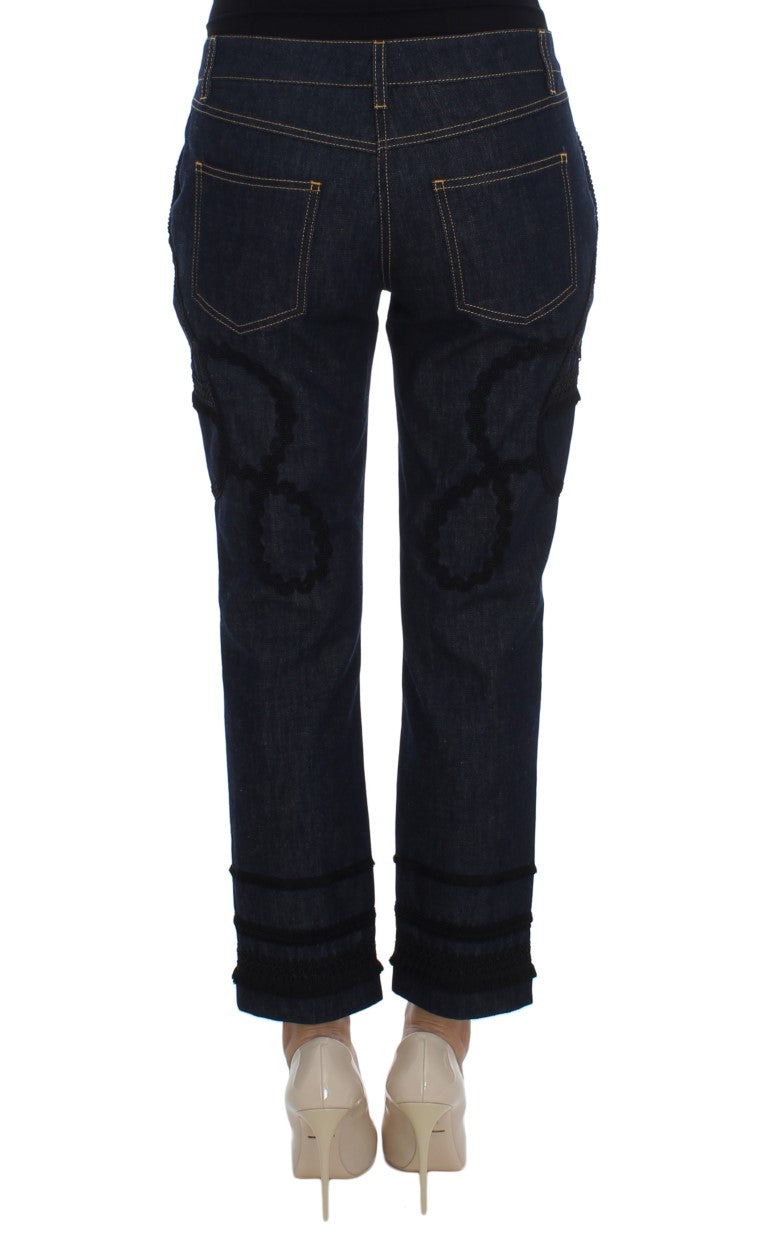 Indulge in the exquisite Dolce & Gabbana Blue Denim Cotton CAPRI Torero Jeans, where unparalleled Italian craftsmanship meets timeless elegance, elevating your style with luxurious allure.