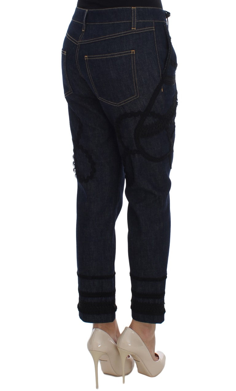 Indulge in the exquisite allure of Dolce & Gabbana's Blue Denim Cotton CAPRI Torero Jeans, where unparalleled craftsmanship meets timeless elegance, perfect for any occasion.