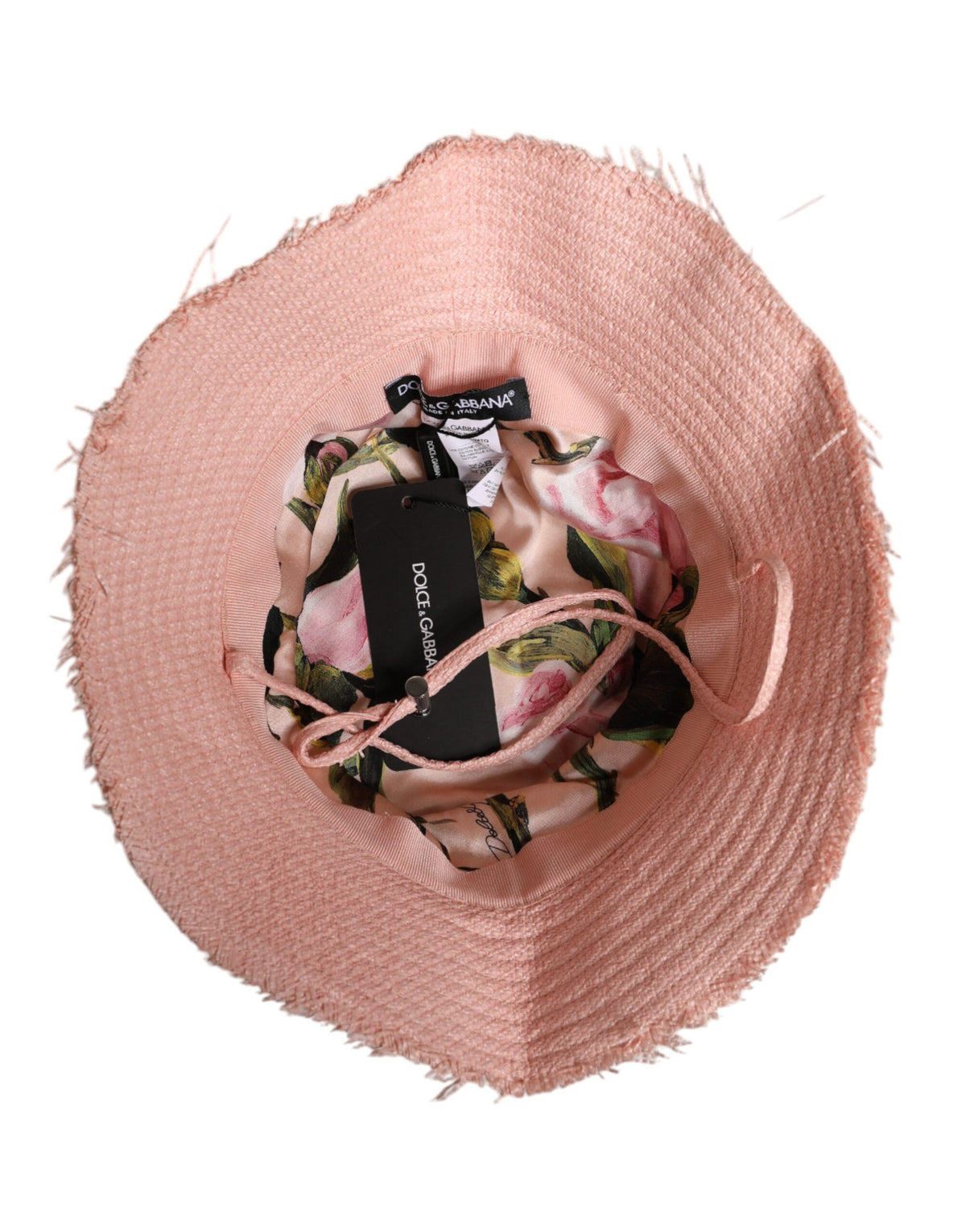 Discover the Dolce & Gabbana Pink Cotton Wide Brim Bucket Hat, a masterpiece of Italian craftsmanship, perfect for elevating your summer elegance with effortless allure.