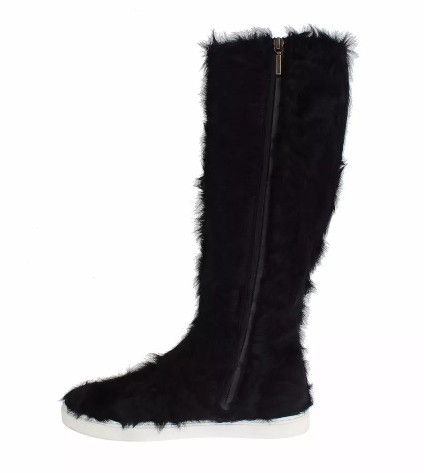 Step into unparalleled luxury with Dolce & Gabbana's Black Xiangao Lamb Fur Leather Boots, crafted from exquisite materials for the discerning individual seeking timeless elegance.