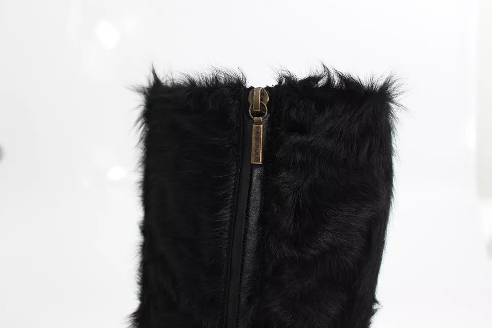 Step into luxury with Dolce & Gabbana's Black Xiangao Lamb Fur Leather Boots, crafted from exquisite materials for the discerning individual seeking timeless elegance.