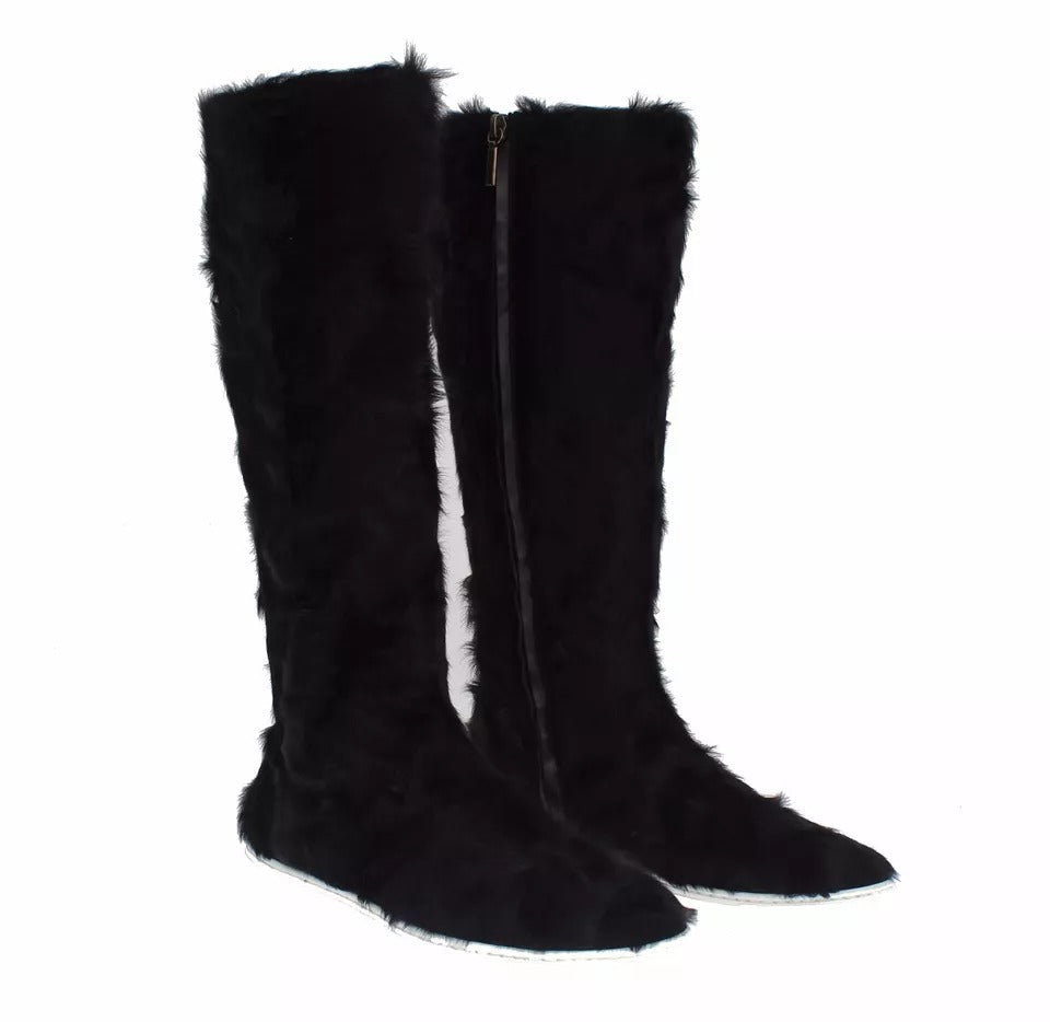 Indulge in the exquisite Dolce & Gabbana Black Xiangao Lamb Fur Leather Boots, where luxurious craftsmanship meets timeless elegance, perfect for the discerning connoisseur.