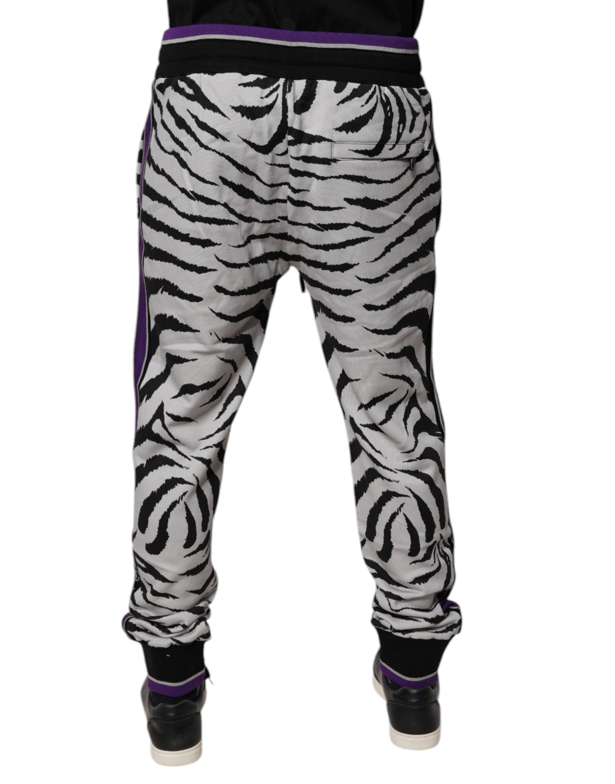 Indulge in the exquisite craftsmanship of Dolce & Gabbana's Black White Zebra Jogger Sweatpants, where luxurious cotton meets bold style for the discerning fashion aficionado.