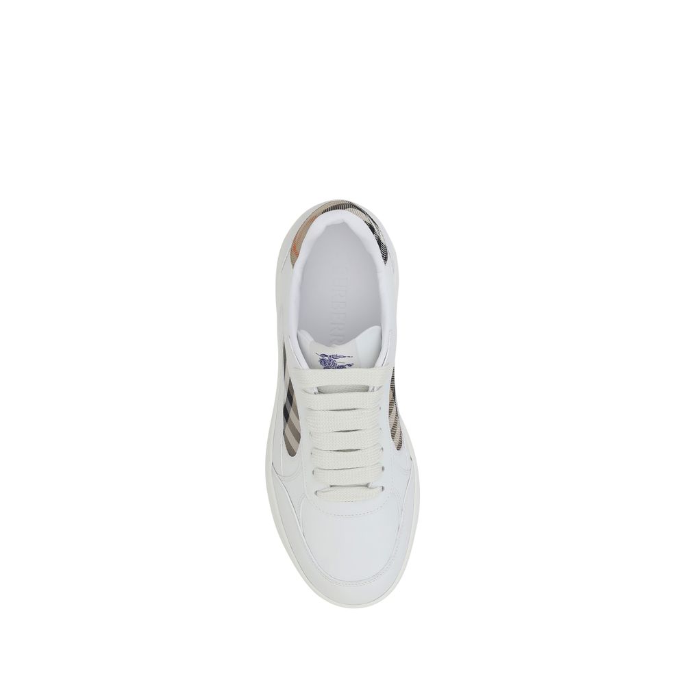Elevate your style with Burberry White Calf Leather Bos Taurus Low Top Sneakers from the Luxe Elegance Redefined Collection, where artisan craftsmanship meets timeless sophistication.
