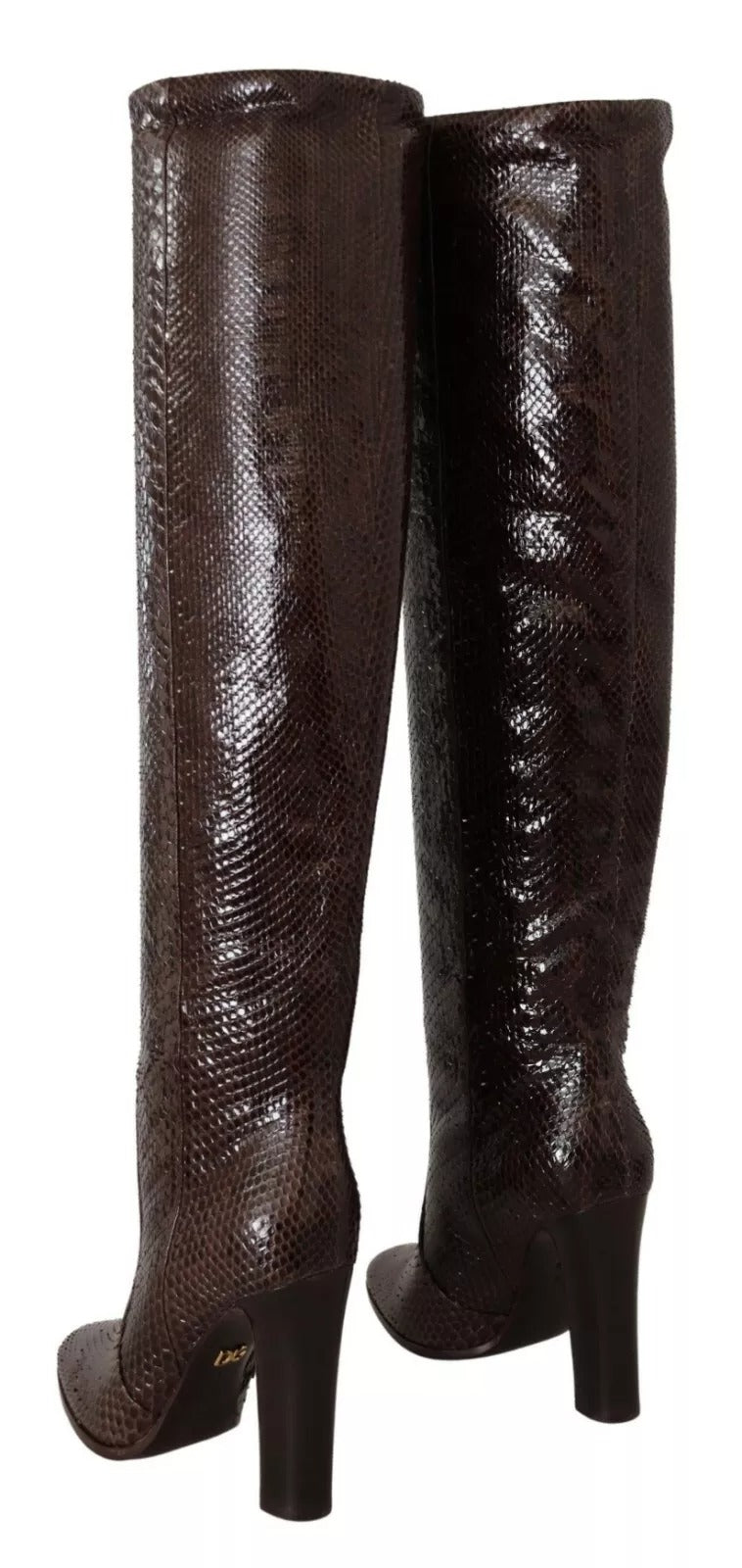 Indulge in the exquisite allure of Dolce & Gabbana's Brown Exotic Leather Heels High Boots, where luxurious craftsmanship meets timeless elegance for the discerning individual.