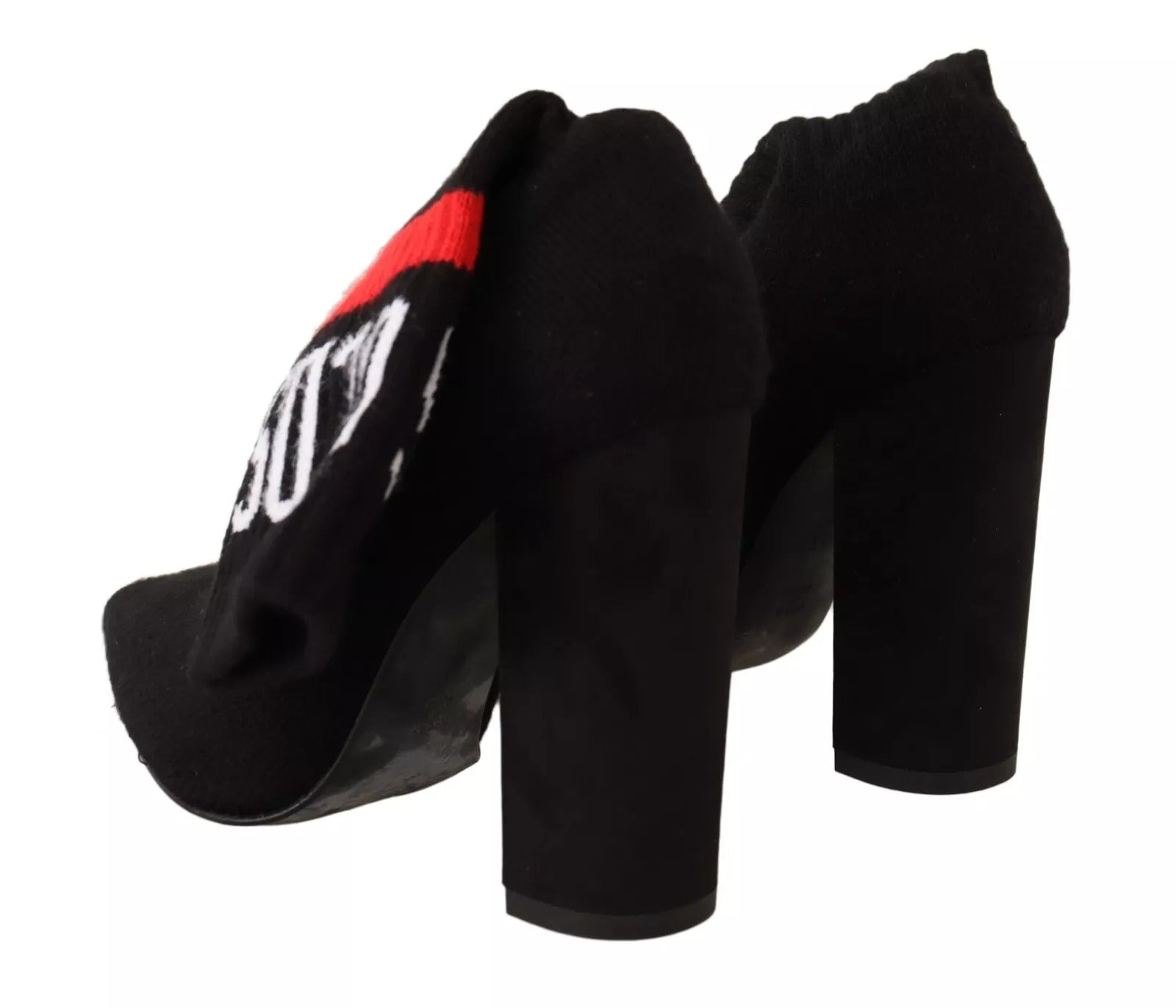 Experience the allure of GCDS Black Suede Logo Socks Block Heel Ankle Boots, where exquisite craftsmanship meets luxurious design for a statement of timeless elegance.