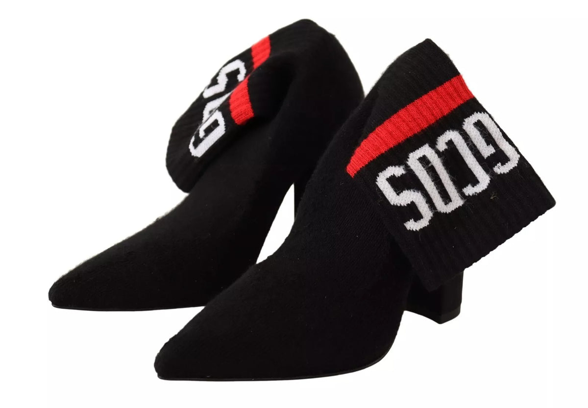 Elevate your style with GCDS Black Suede Logo Socks Block Heel Ankle Boots, where exquisite craftsmanship meets luxurious elegance for the discerning individual.