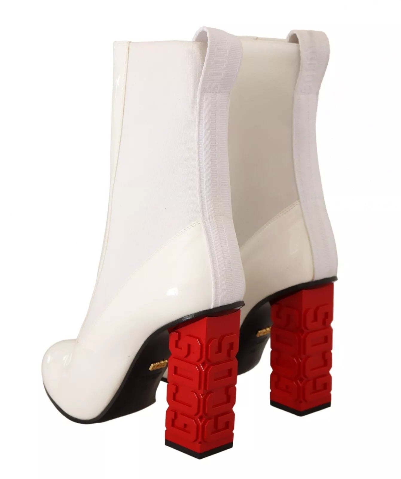 Step into a realm of elegance with GCDS White Leather Fabric Red Logo Heel Ankle Boots, where luxurious craftsmanship meets bold design for the discerning individual.