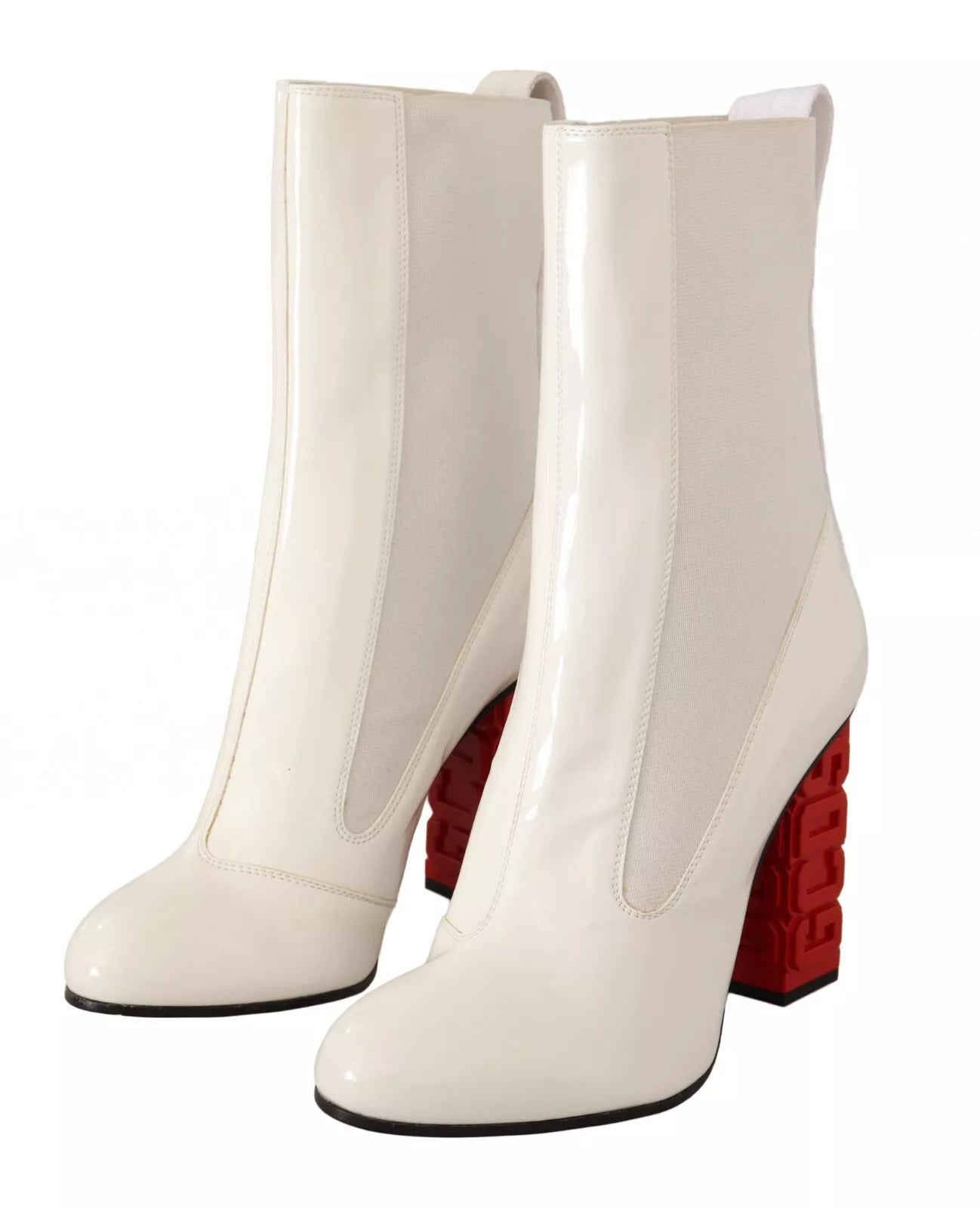 Step into the realm of elegance with GCDS White Leather Fabric Red Logo Heel Ankle Boots, where luxurious craftsmanship meets bold design for the discerning individual.