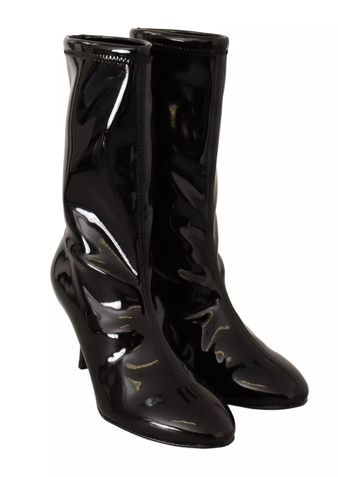 Step into unparalleled elegance with Stuart Weitzman's Black Patent Leather High Heels, a luxurious statement of sophistication crafted for the discerning individual.