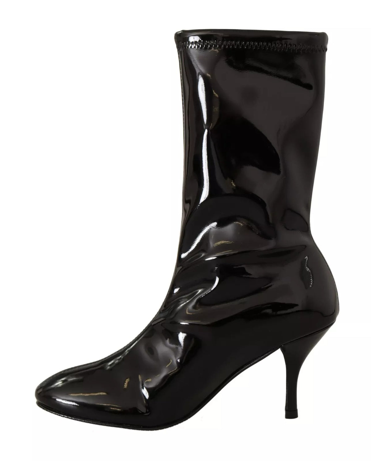 Step into elegance with Stuart Weitzman's Black Patent Leather High Heels, a luxurious expression of sophistication and timeless allure for the discerning individual.