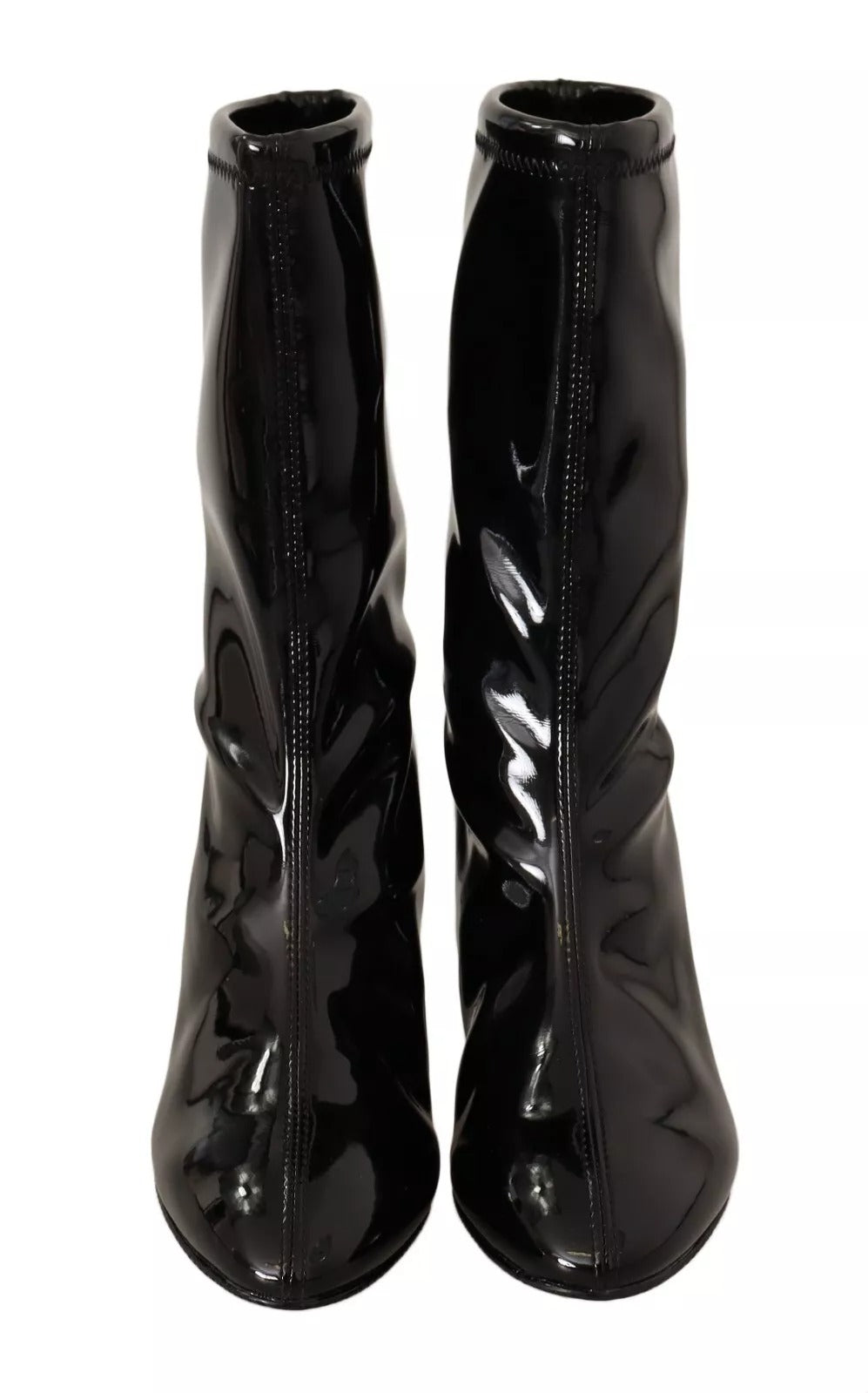 Step into sophistication with Stuart Weitzman's Black Patent Leather High Heels, where exquisite craftsmanship meets timeless elegance, perfect for any occasion.