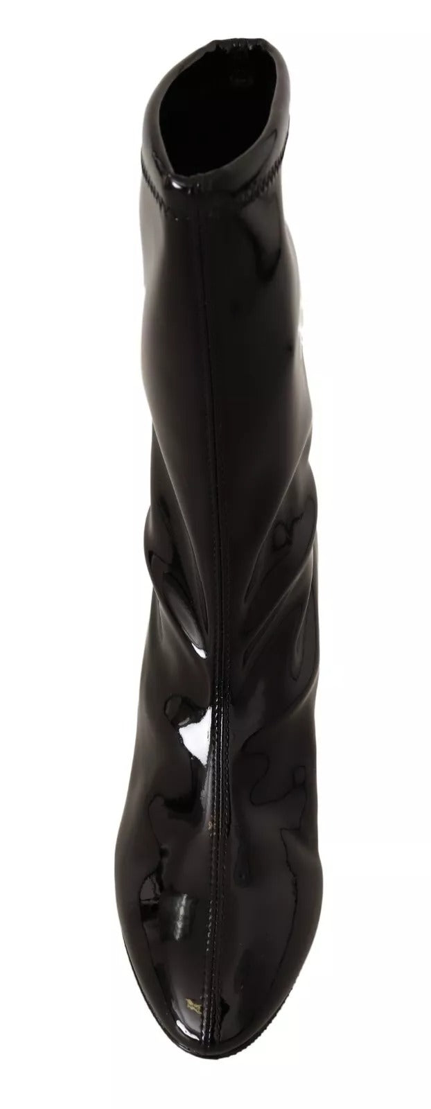Step into sophistication with Stuart Weitzman's Black Patent Leather High Heels, where exquisite craftsmanship meets timeless elegance, perfect for any discerning wardrobe.