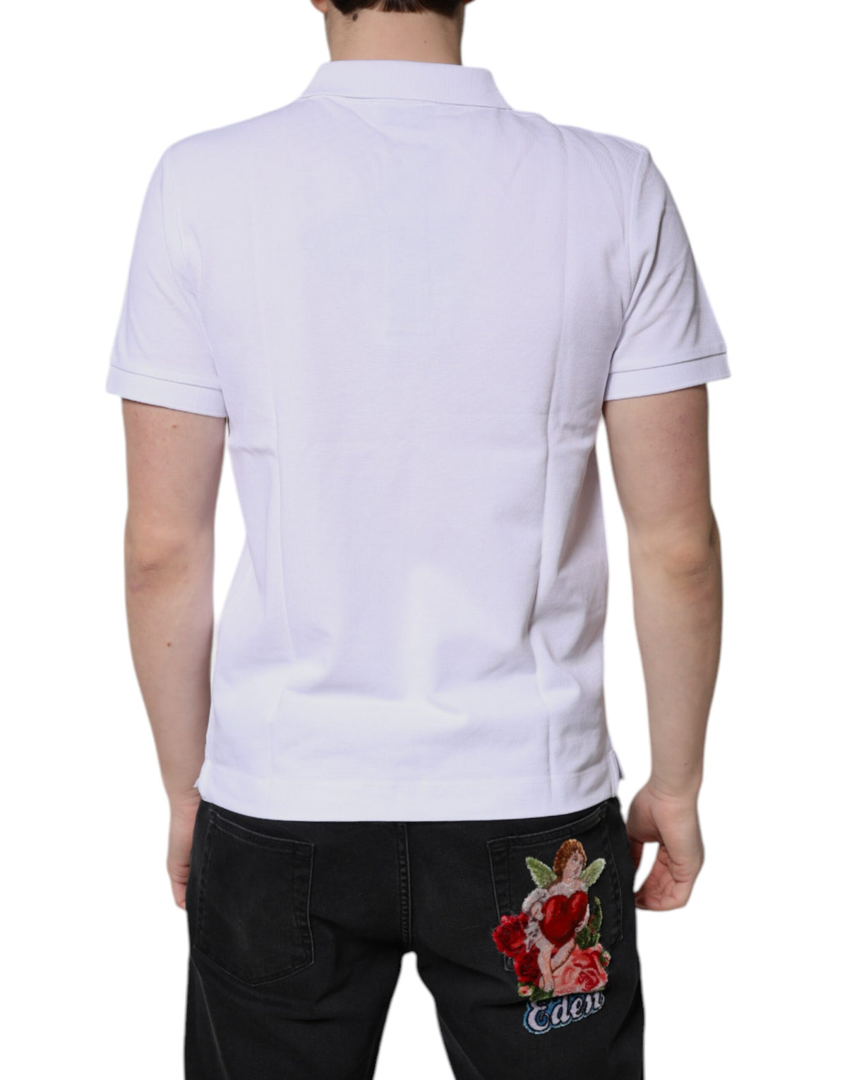 Elevate your wardrobe with the Dolce & Gabbana White Cotton Crown Collared Polo T-shirt, a symbol of Italian craftsmanship and timeless sophistication, perfect for discerning individuals.