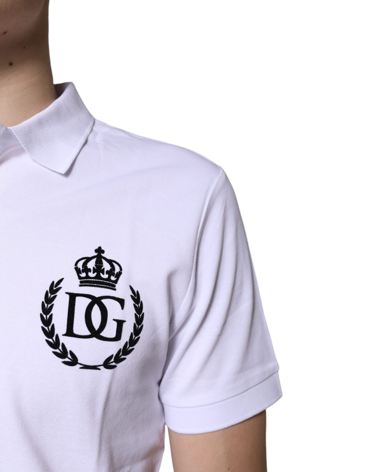 Elevate your wardrobe with the Dolce & Gabbana White Cotton Crown Collared Men Polo T-shirt, a symbol of Italian craftsmanship and timeless sophistication.