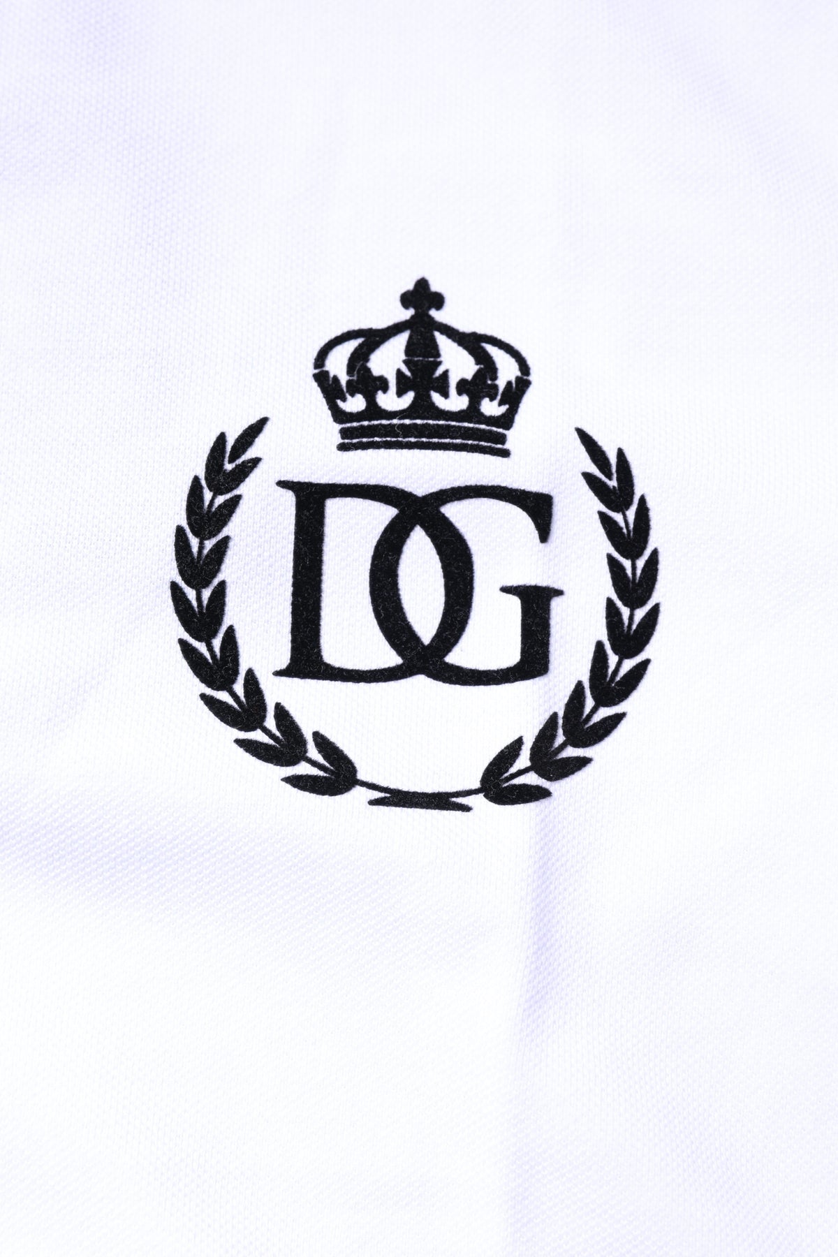 Discover the Dolce & Gabbana White Cotton Crown Collared Polo T-shirt, a symbol of Italian craftsmanship that elevates your style with timeless elegance and luxurious comfort.