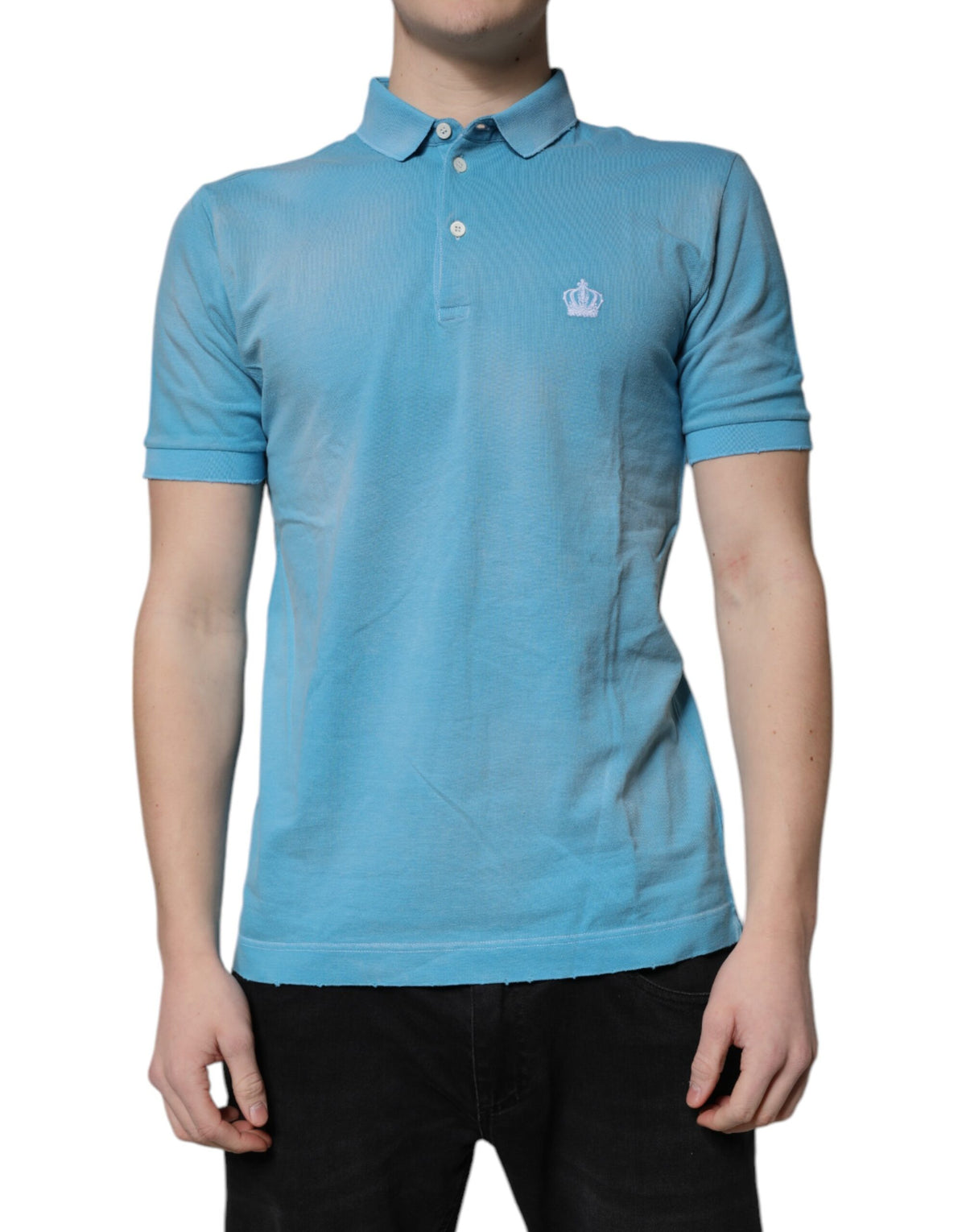 Experience the allure of Dolce & Gabbana's Blue Cotton Crown Collared Polo T-shirt, a testament to Italian craftsmanship that elevates your wardrobe with timeless elegance.