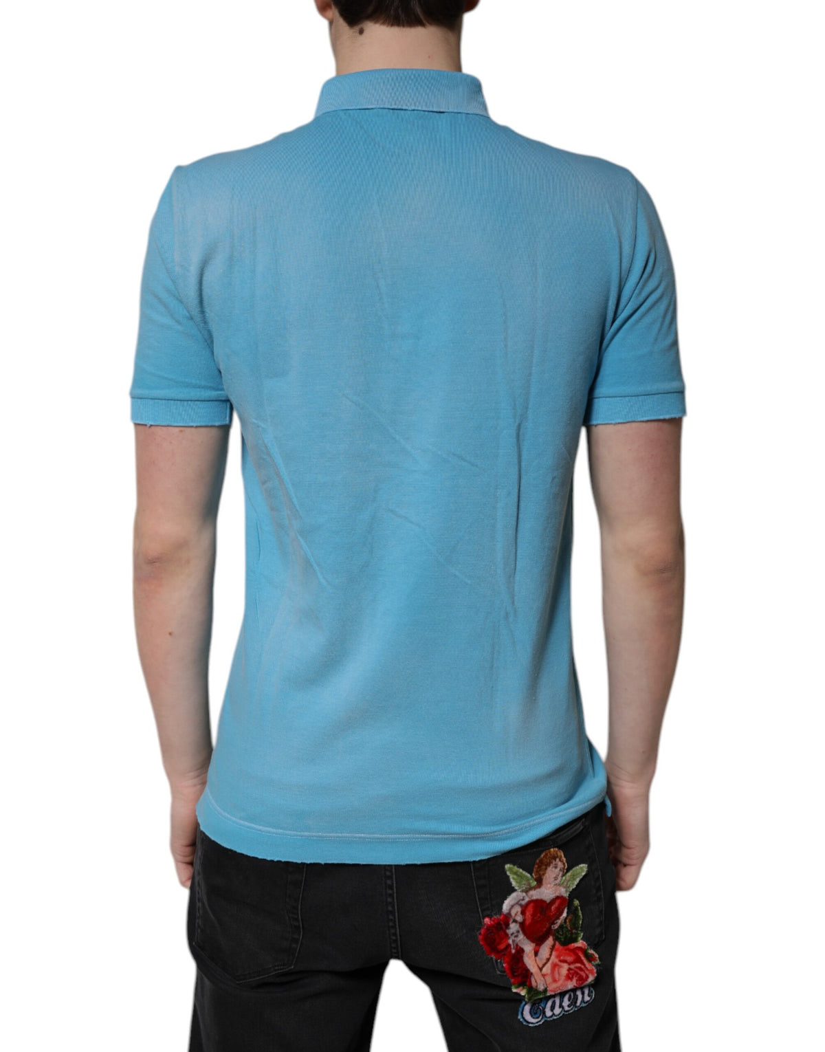 Elevate your wardrobe with the Dolce & Gabbana Blue Cotton Crown Collared Polo T-shirt, a testament to Italian craftsmanship and timeless elegance, perfect for the discerning individual.
