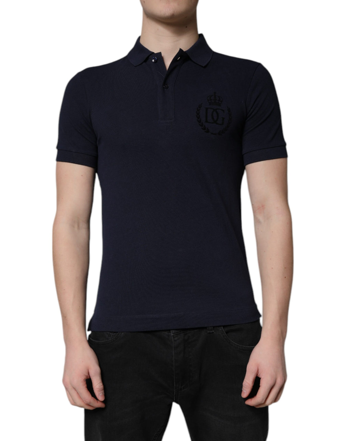 Indulge in the exquisite Dolce & Gabbana Dark Blue Cotton Crown Collared Polo T-shirt, a testament to Italian craftsmanship and timeless elegance, perfect for any occasion.