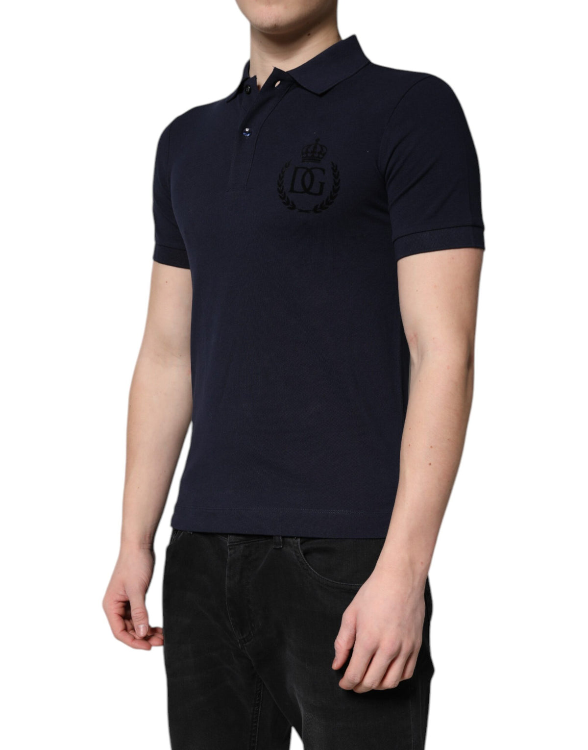 Elevate your wardrobe with the Dolce & Gabbana Dark Blue Cotton Crown Collared Polo T-shirt, a testament to Italian luxury and meticulous craftsmanship, perfect for any occasion.
