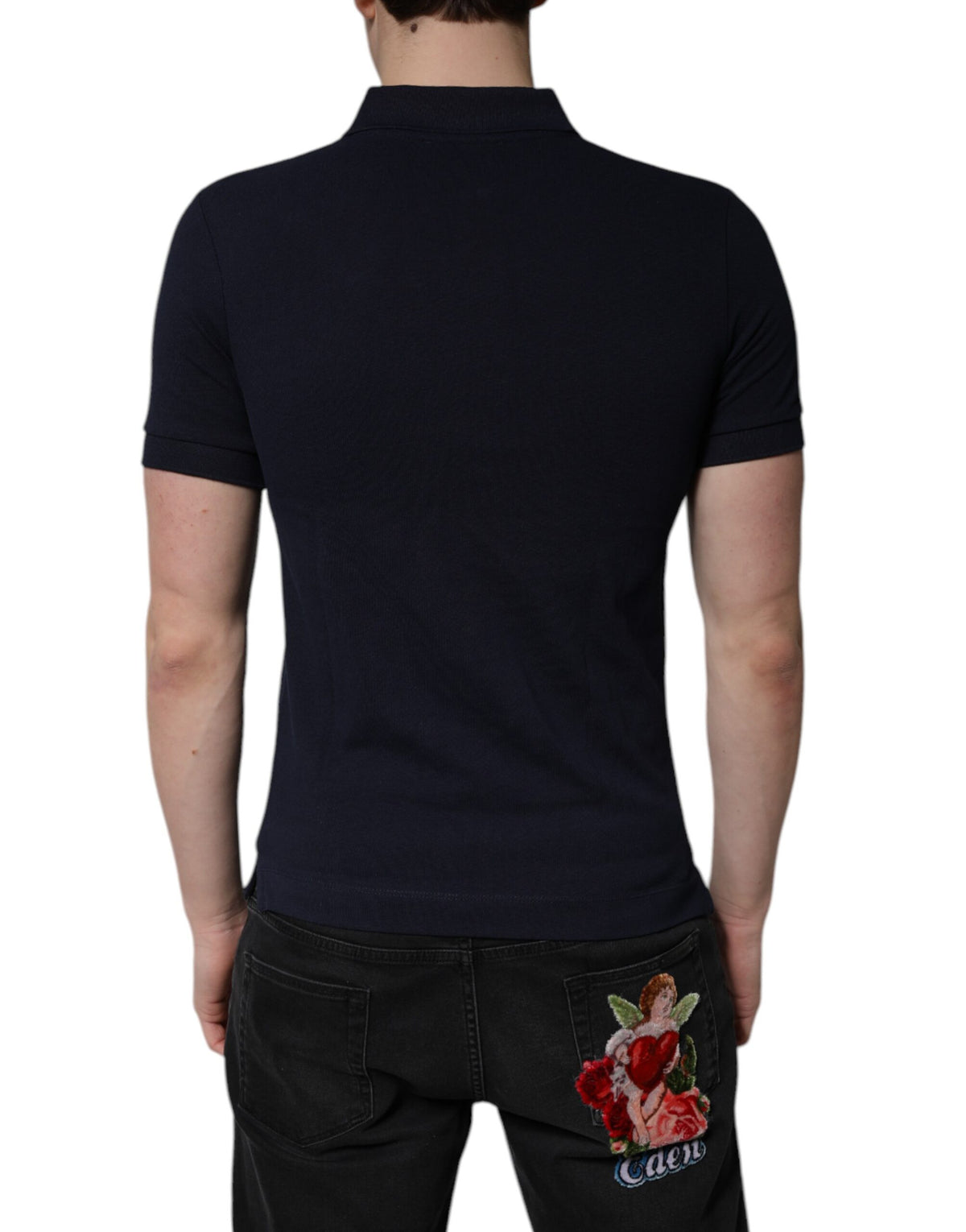Elevate your wardrobe with the Dolce & Gabbana Dark Blue Cotton Crown Collared Polo T-shirt, a masterpiece of Italian craftsmanship in luxurious 100% cotton, perfect for any occasion.