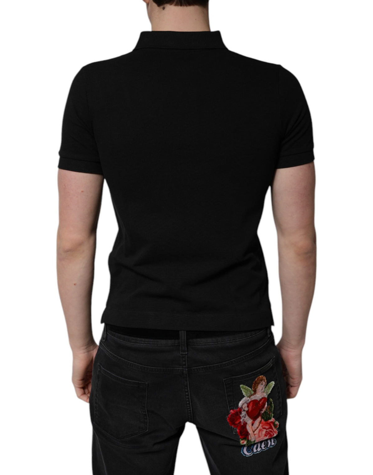 Elevate your wardrobe with the Dolce & Gabbana Black Cotton DG Logo Collared Polo T-shirt, a symbol of Italian craftsmanship and timeless sophistication for the discerning individual.