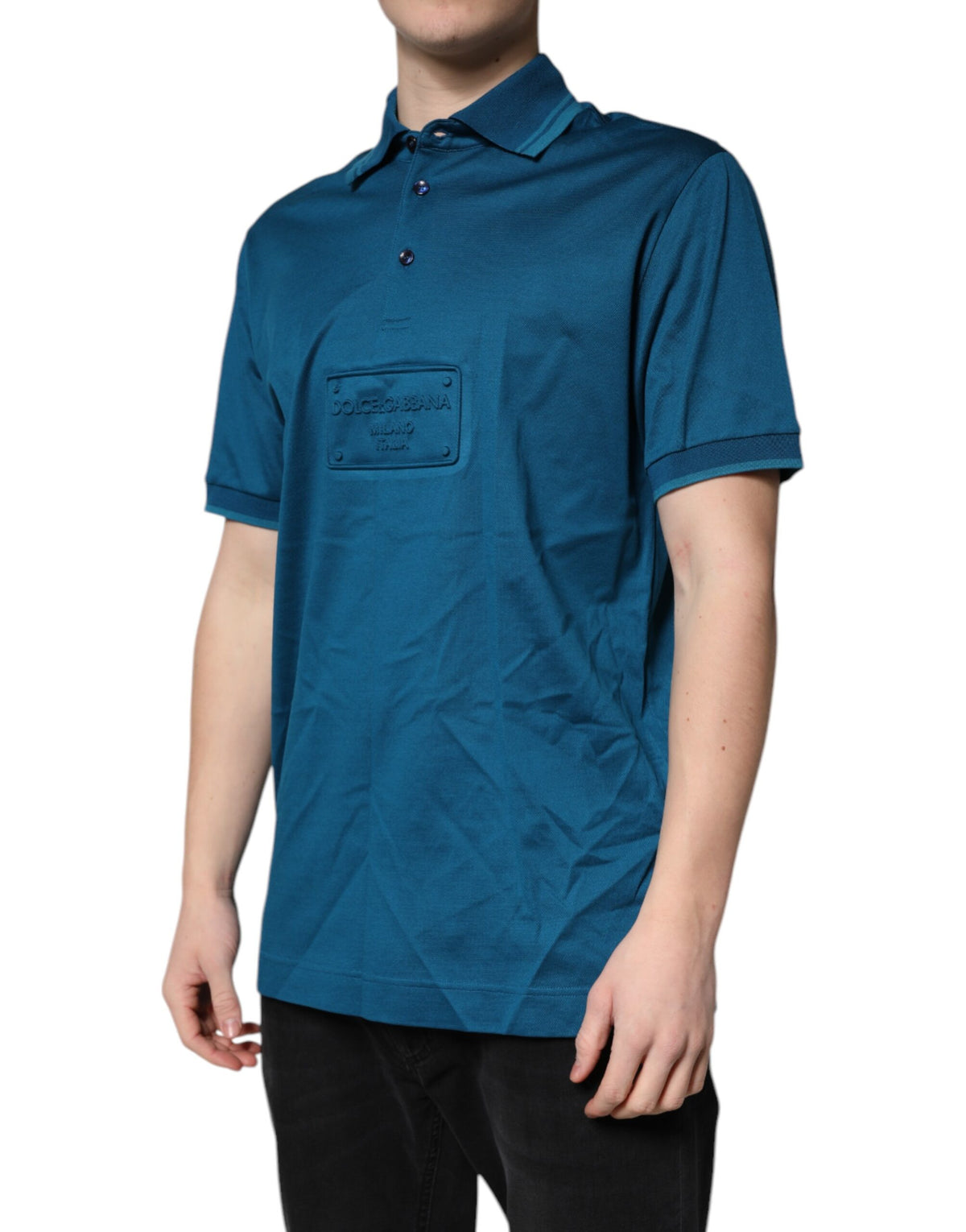 Experience the exquisite Dolce & Gabbana Blue Logo Cotton Men Polo Shirt, a luxurious blend of 100% cotton and iconic design, perfect for the discerning individual.