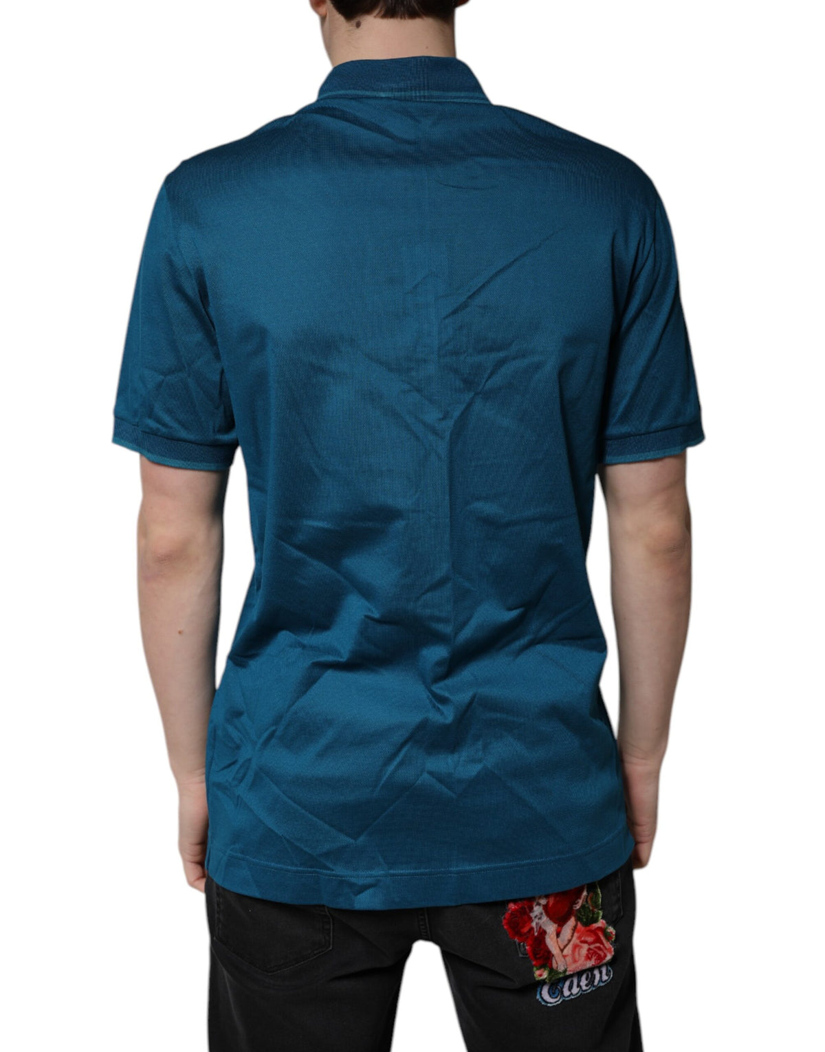 Elevate your wardrobe with the Dolce & Gabbana Blue Logo Cotton Men Polo Shirt, a masterpiece of Italian craftsmanship in luxurious cotton, perfect for the discerning individual.