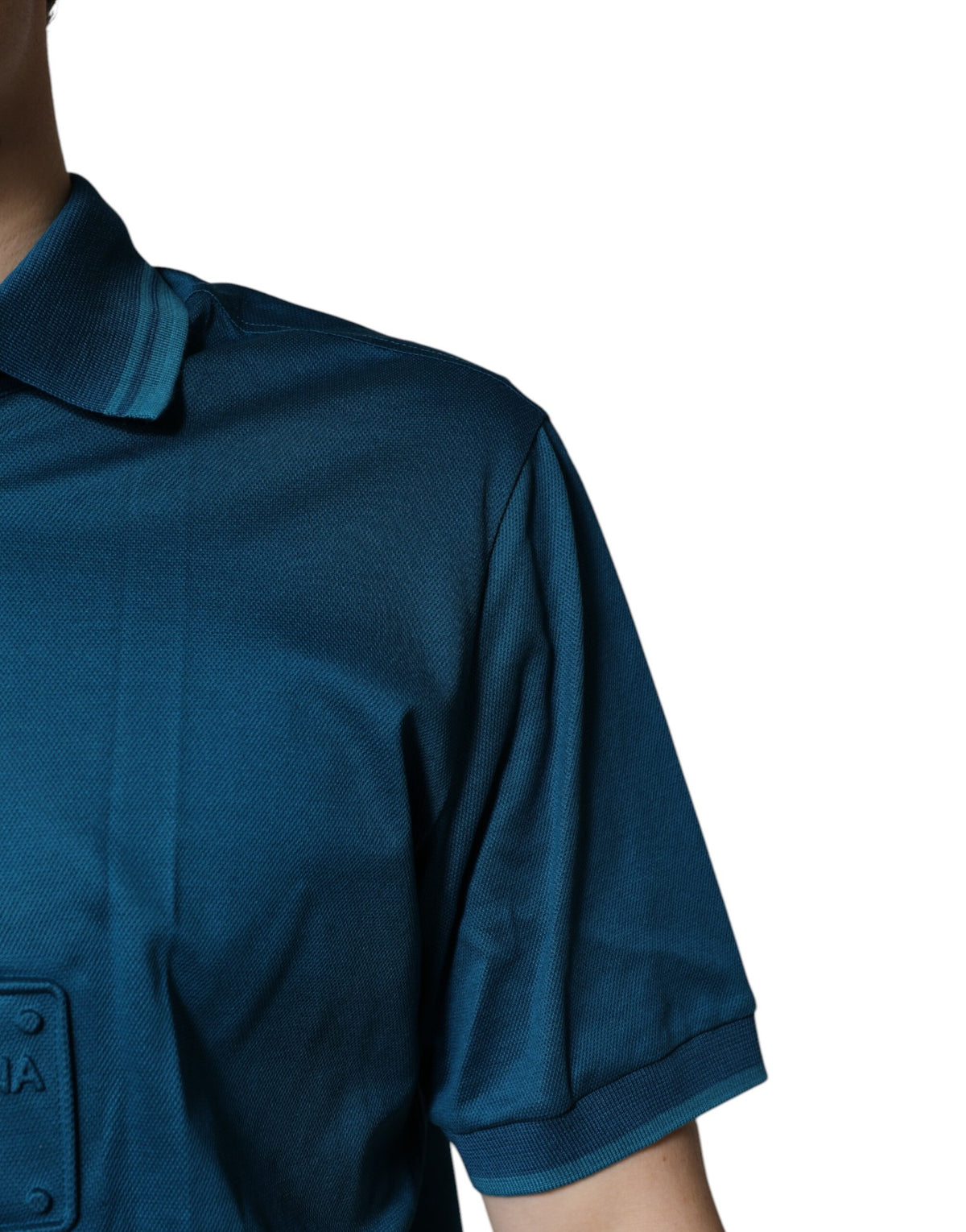 Elevate your wardrobe with the Dolce & Gabbana Blue Logo Cotton Men Polo Shirt, a masterpiece of Italian craftsmanship that embodies luxury and sophistication.