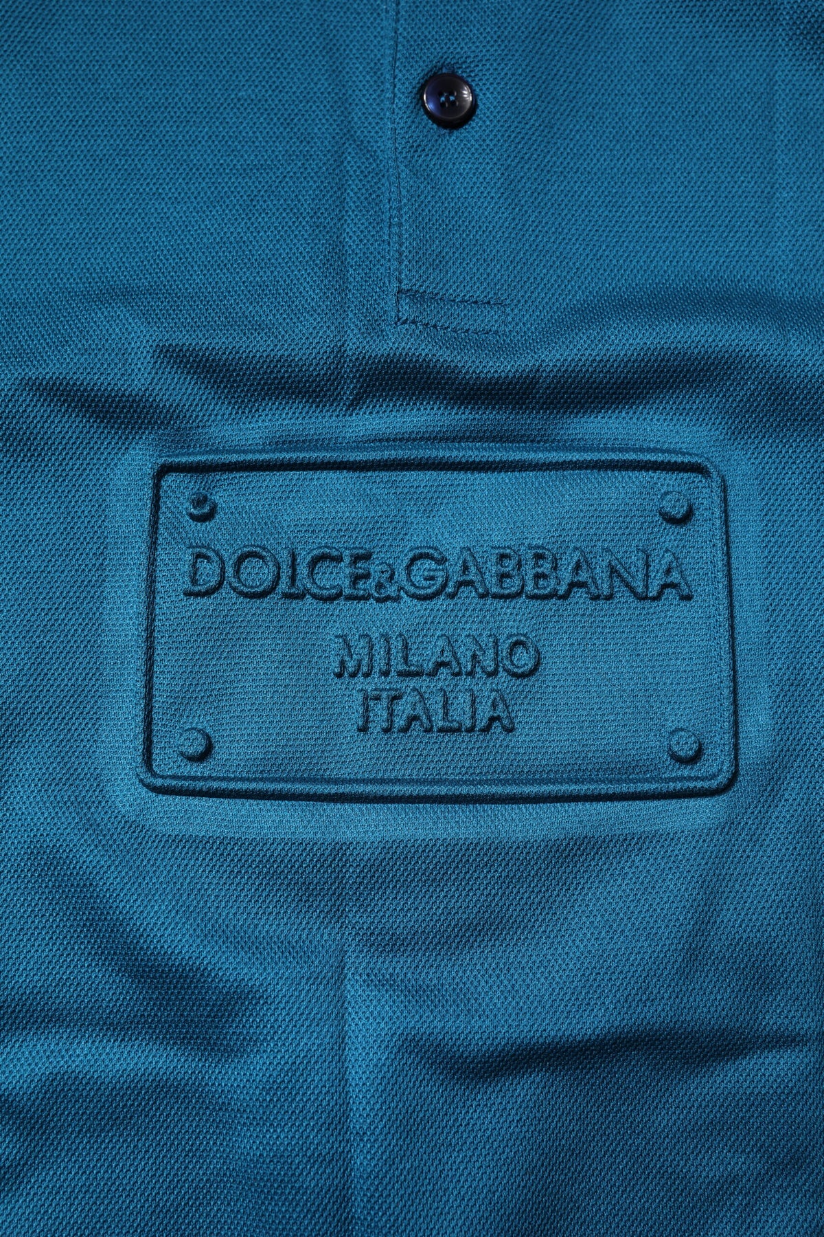 Experience the allure of the Dolce & Gabbana Blue Logo Cotton Men Polo Shirt, crafted in Italy from premium cotton, embodying timeless elegance and sophisticated style.