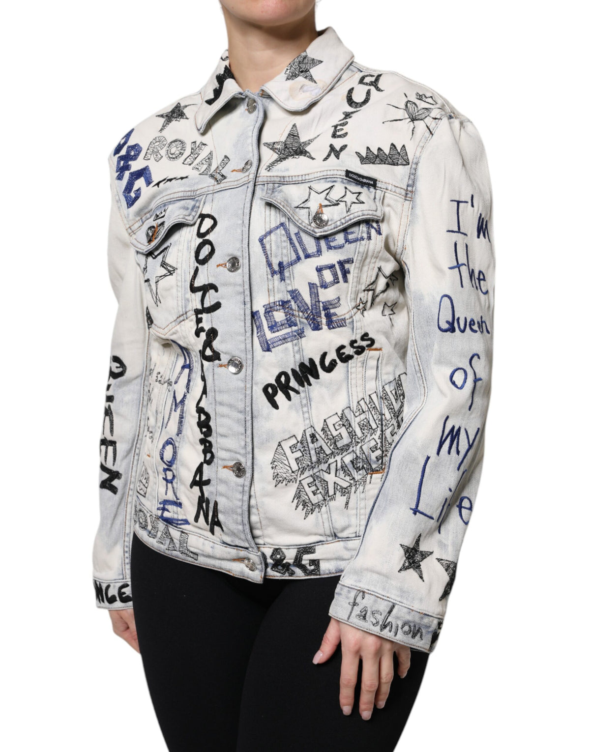 Elevate your wardrobe with the Dolce & Gabbana Light Blue Graffiti Button Down Denim Jacket, a fusion of exquisite craftsmanship and vibrant artistry, designed for the discerning individual.