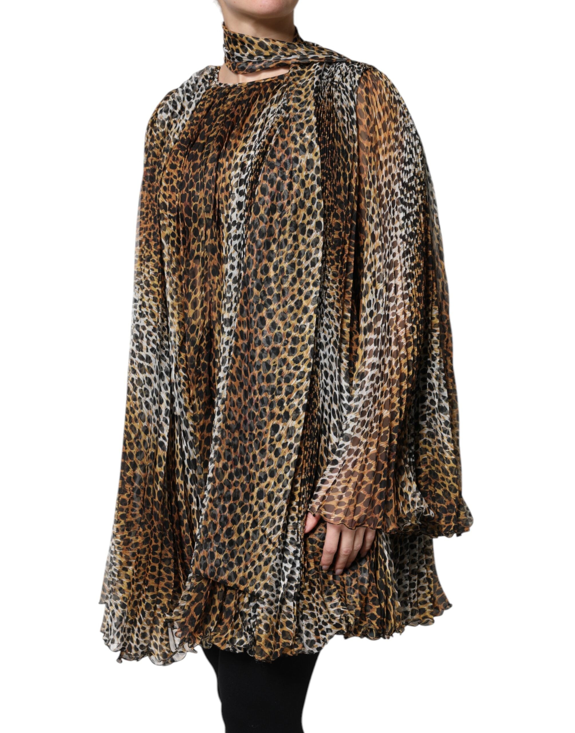 Indulge in the exquisite Dolce & Gabbana Brown Leopard Print Scarf Collared Chiffon Dress, where luxurious silk and meticulous Italian craftsmanship create an alluring statement of elegance.