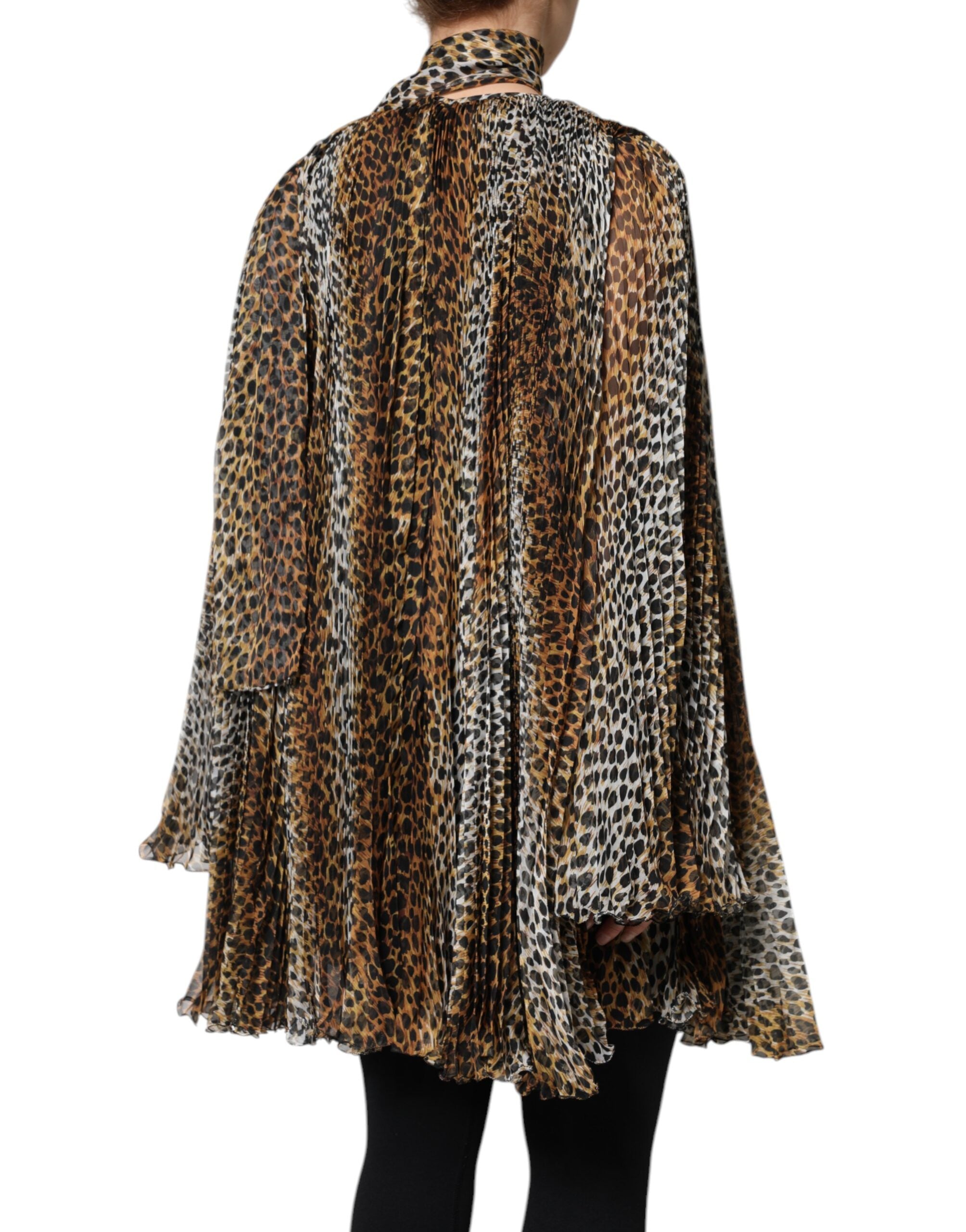 Indulge in the allure of the Dolce & Gabbana Brown Leopard Print Scarf Collared Chiffon Dress, a masterpiece of Italian craftsmanship, blending luxurious chiffon and silk for timeless elegance.