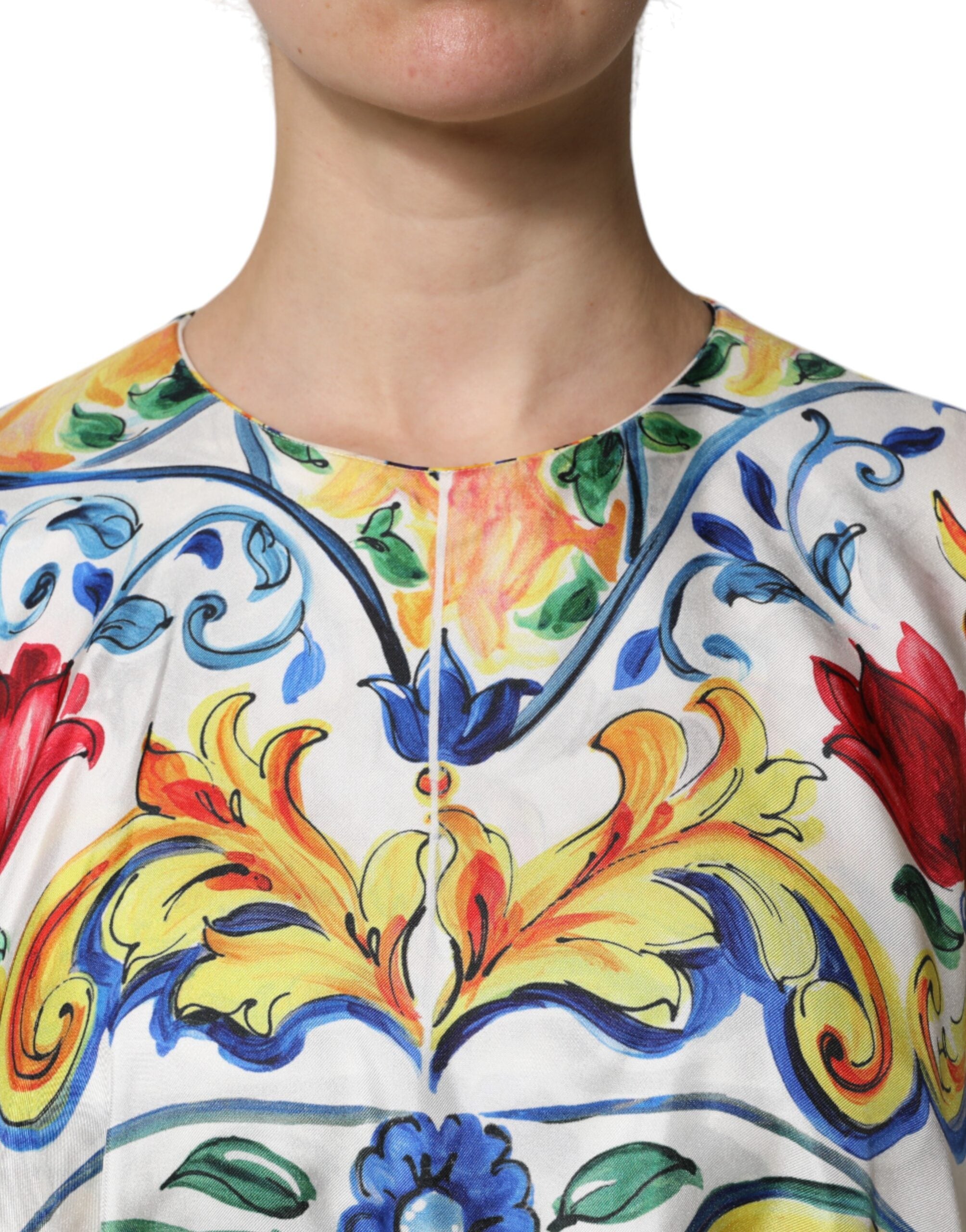 Indulge in the exquisite Dolce & Gabbana Multicolor Majolica Kaftan, a silk masterpiece that embodies luxury and sophistication for every elegant occasion.