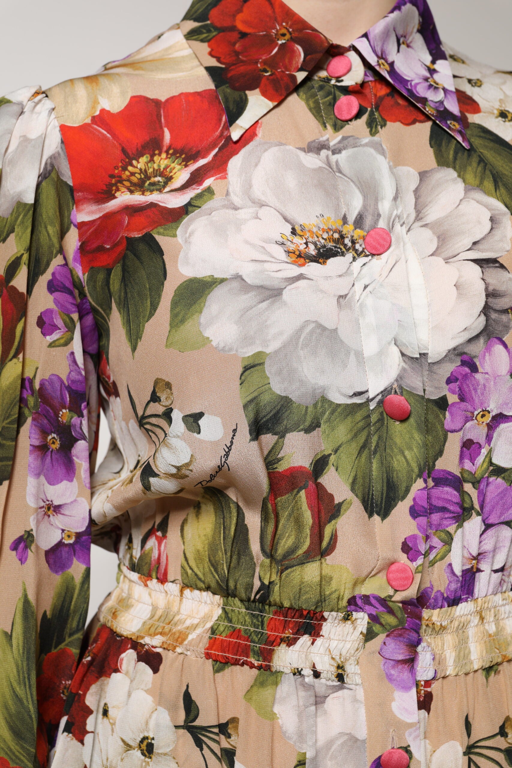 Indulge in the exquisite Dolce & Gabbana Multicolor Floral Wide Leg Jumpsuit Dress, crafted from luxurious silk, embodying sophistication and timeless elegance for the discerning individual.