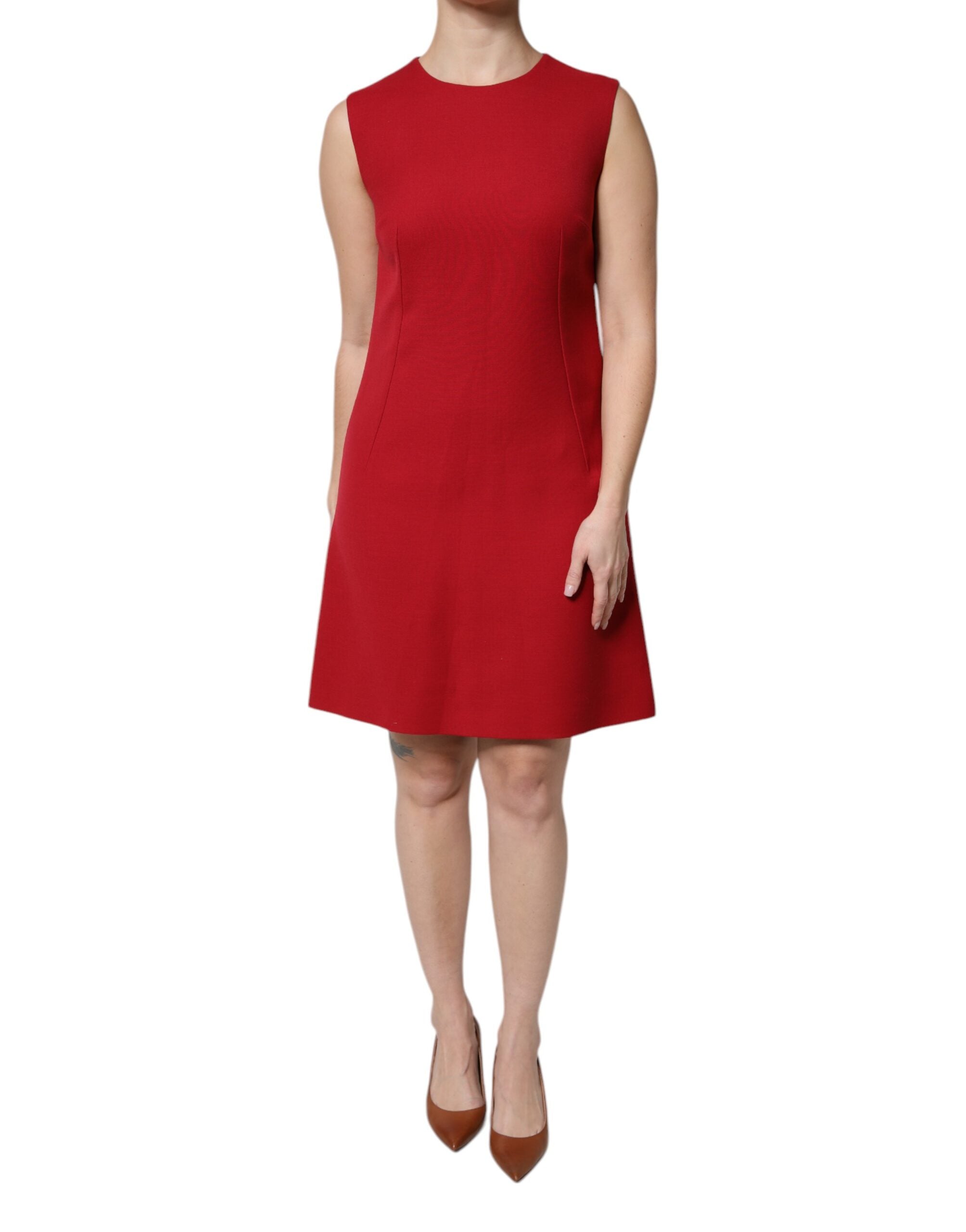 Experience the allure of the Dolce & Gabbana Red Wool Sleeveless A-line Dress, a masterpiece of Italian craftsmanship that embodies elegance and confidence for any occasion.