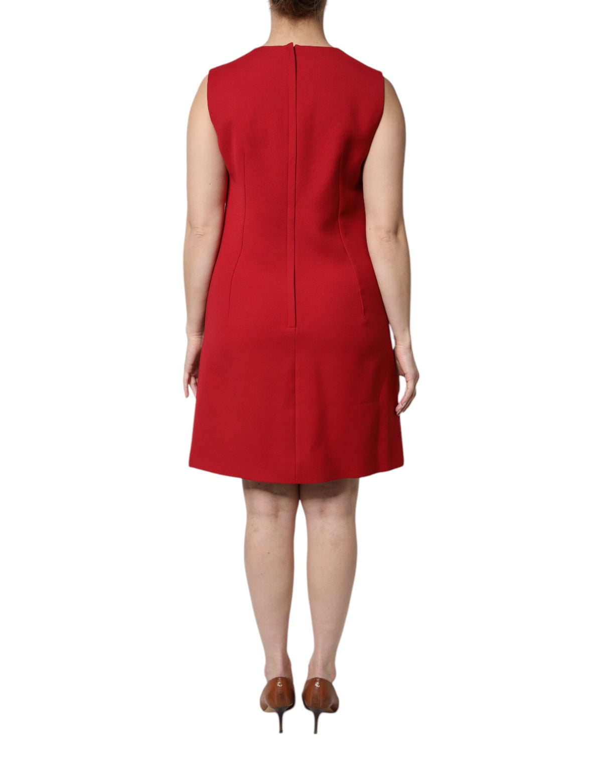 Experience the allure of the Dolce & Gabbana Red Wool Sleeveless A-line Dress, a masterpiece of Italian craftsmanship that embodies timeless elegance and sophistication.