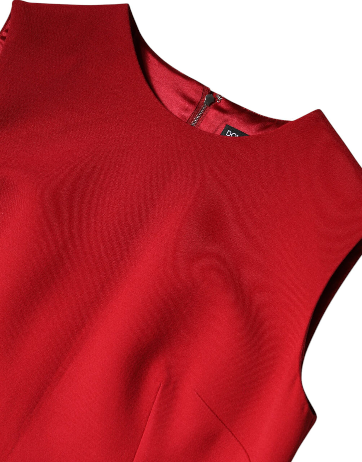 Experience the allure of the Dolce & Gabbana Red Wool Sleeveless A-line Dress, a luxurious masterpiece crafted in Italy, designed to elevate your elegance and confidence.