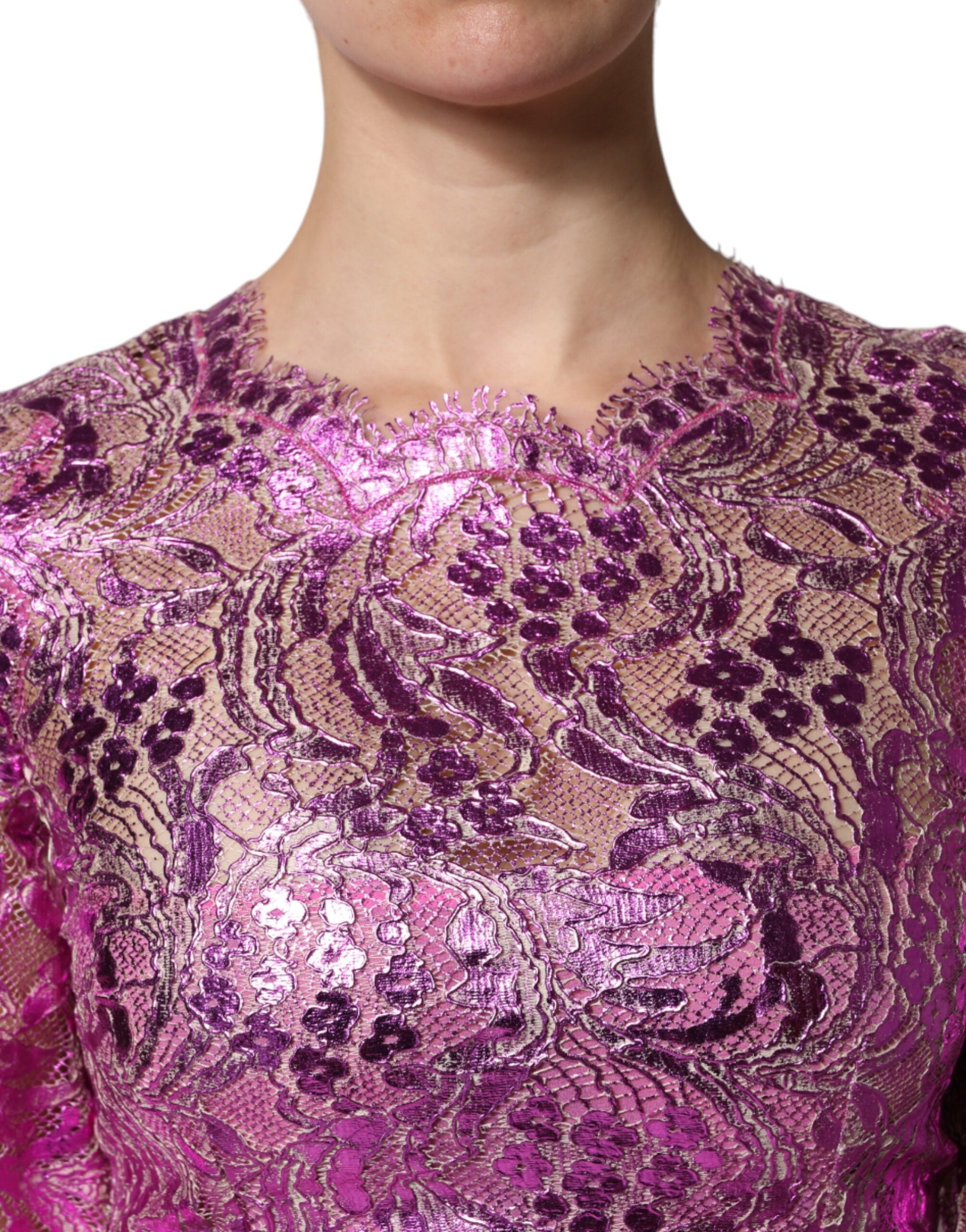 Indulge in the Dolce & Gabbana Metallic Fuchsia Floral Sheath Mini Dress, where exquisite silk and cotton blend create a captivating silhouette of timeless elegance.